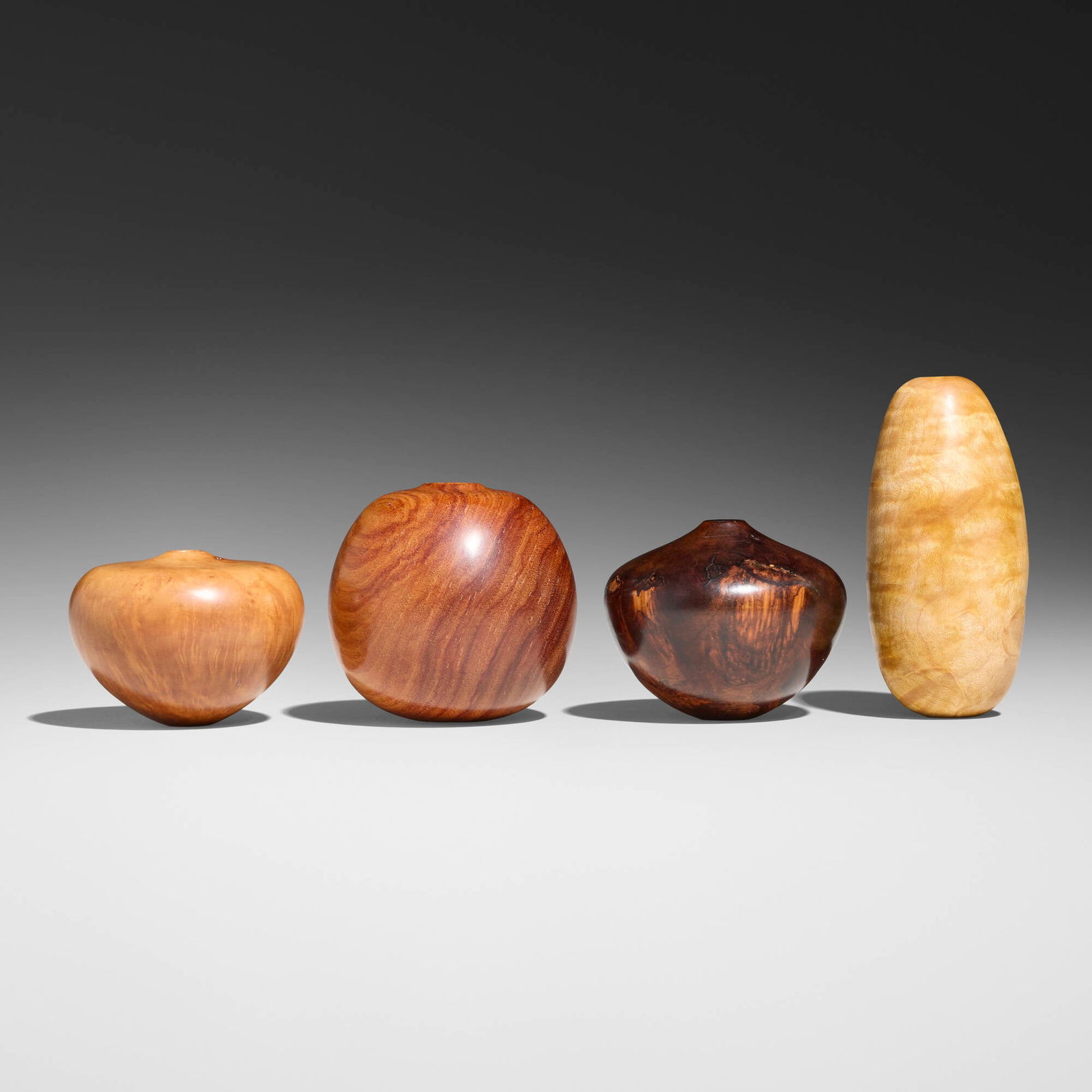 David Ellsworth, Collection of four miniature vessels: David Ellsworth Collection of four miniature vessels 1992, 1998silver leaf maple, cocobolo, briar burl, tulipwood tallest: 3.25 h x 1.5 dia in (8 x 4 cm) shortest: 1.75 h x 2.25 dia in (4 x 6 cm)<