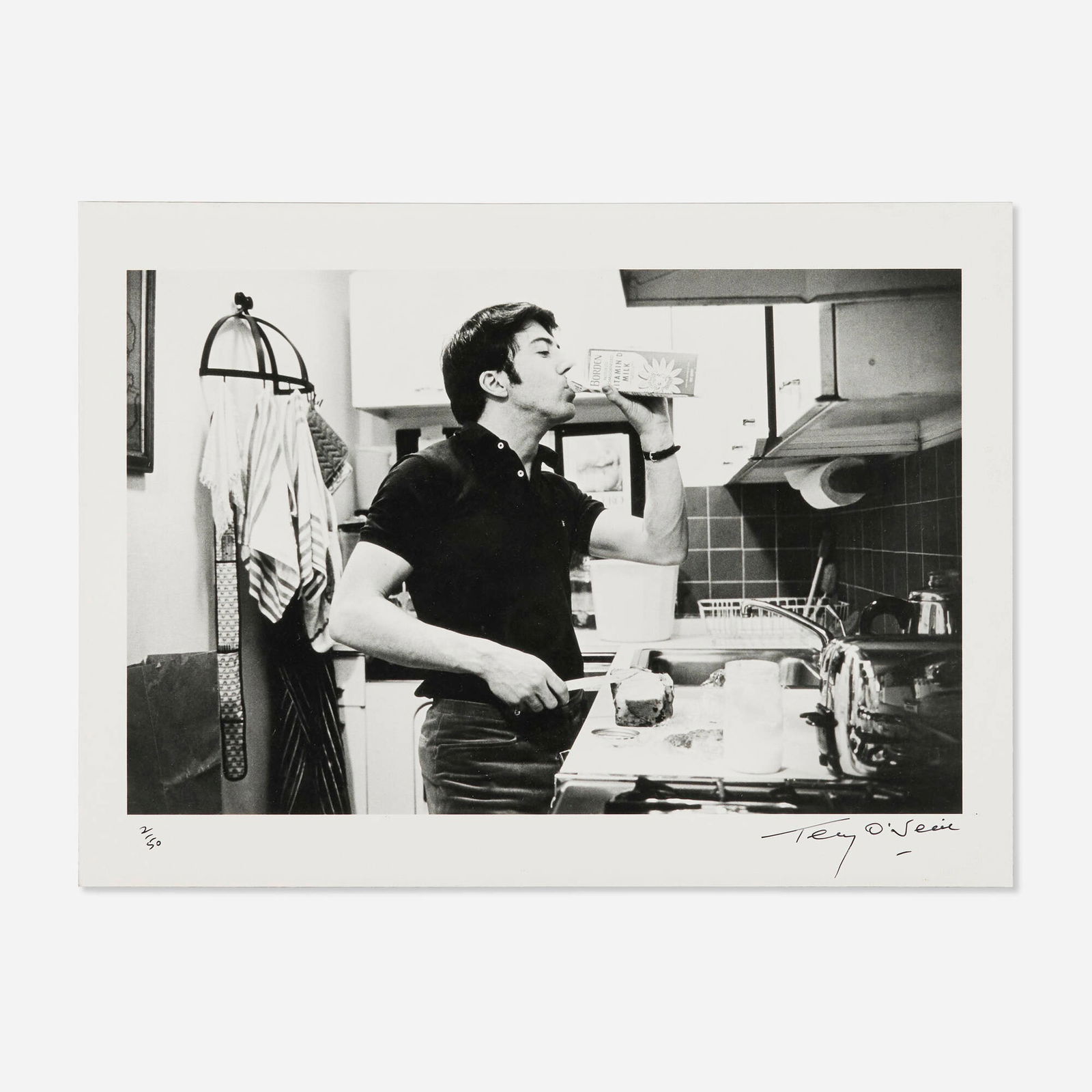 Terry O'Neill, Dustin Hoffma: Terry O'Neill Dustin Hoffman drinking milk during the filming of 'John and Mary' by director Peter Yakes in NYC 1969 / printed latergelatin silver print image: 8.75 h x 13.5 w in (22 x 34 cm) sigh