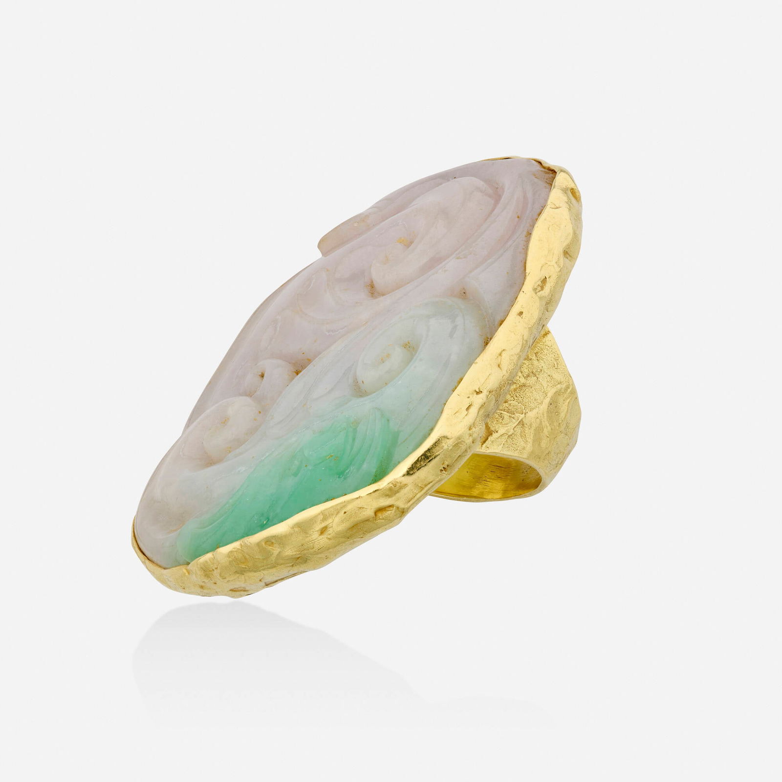 Ed Wiener, Jadeite and gold ring: Ed Wiener Jadeite and gold ring Set with carved jadeite 18k yellow gold Signed EW Ring size 7; Gross weight 49.5 dwts This work will ship from Lambertville, New Jersey.