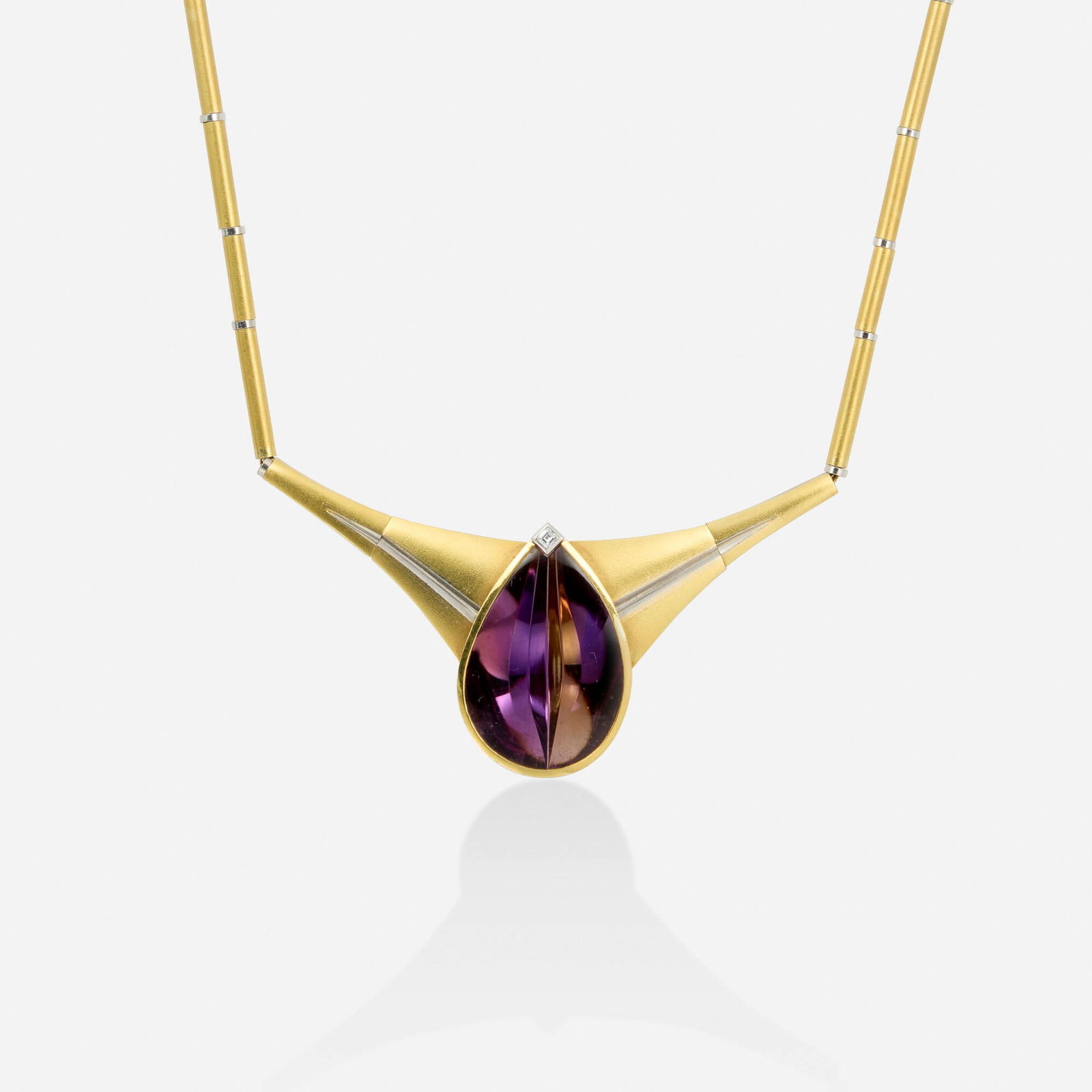 Atelier Munsteiner, Ametrine, diamond, and bicolor gold necklace: Atelier Munsteiner Ametrine, diamond, and bicolor gold necklace The pendant designed with a fancy-cut ametrine and square-cut diamond, joined by cylindrical links 18k yellow and white gold Signed with