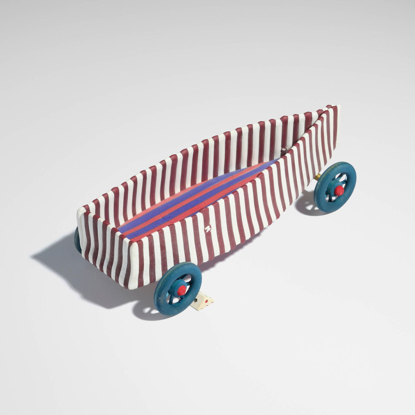 Richard Marquis, Wheeled Vessel: Richard Marquis Wheeled Vessel 2002glass, wood, brass, plastic, half dice 3 h x 11.25 w x 4.75 d in (8 x 29 x 12 cm) Etched signature and number to underside '2402 Marquis'. Pro