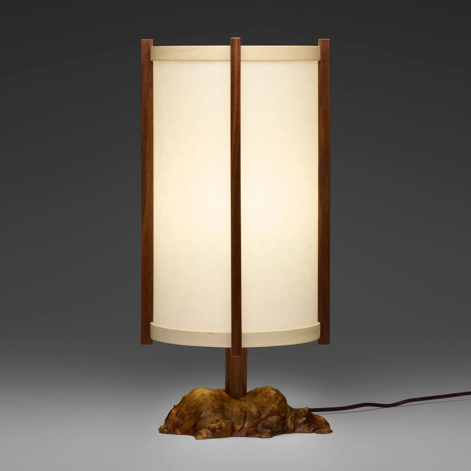 Mira Nakashima, Desk lamp: Mira Nakashima Desk lamp Nakashima StudioUSA, 2022Oregon myrtle burl, American black walnut, holly, handmade washi parchment 20.5 h x 10.25 w x 10 d in (52 x 26 x 25 cm) Signed, dated an