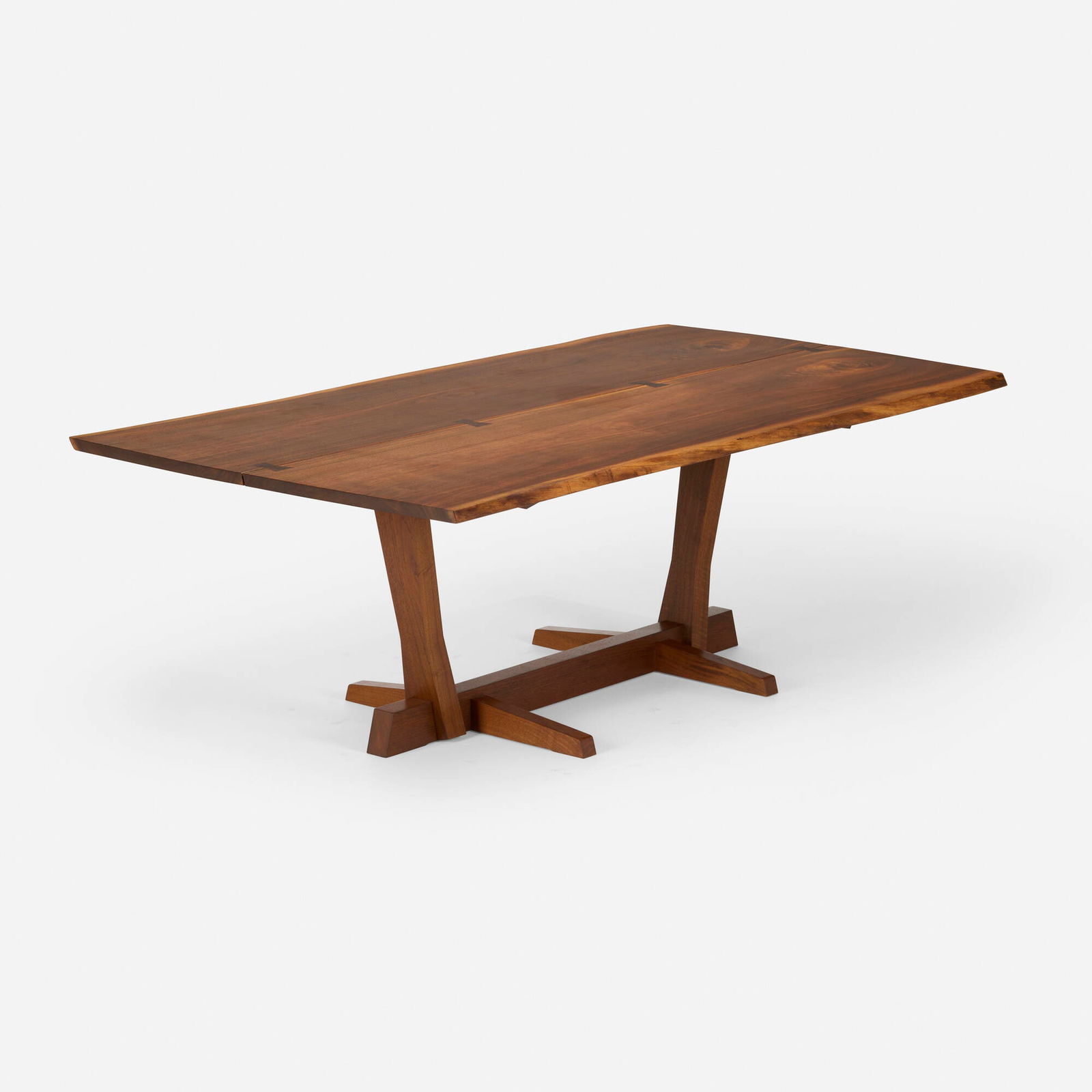 George Nakashima, Conoid dining table: George Nakashima Conoid dining table Nakashima StudioUSA, 1974American black walnut, rosewood 29 h x 84 w x 47 d in (74 x 213 x 119 cm) Table features a book-matched top with two free ed