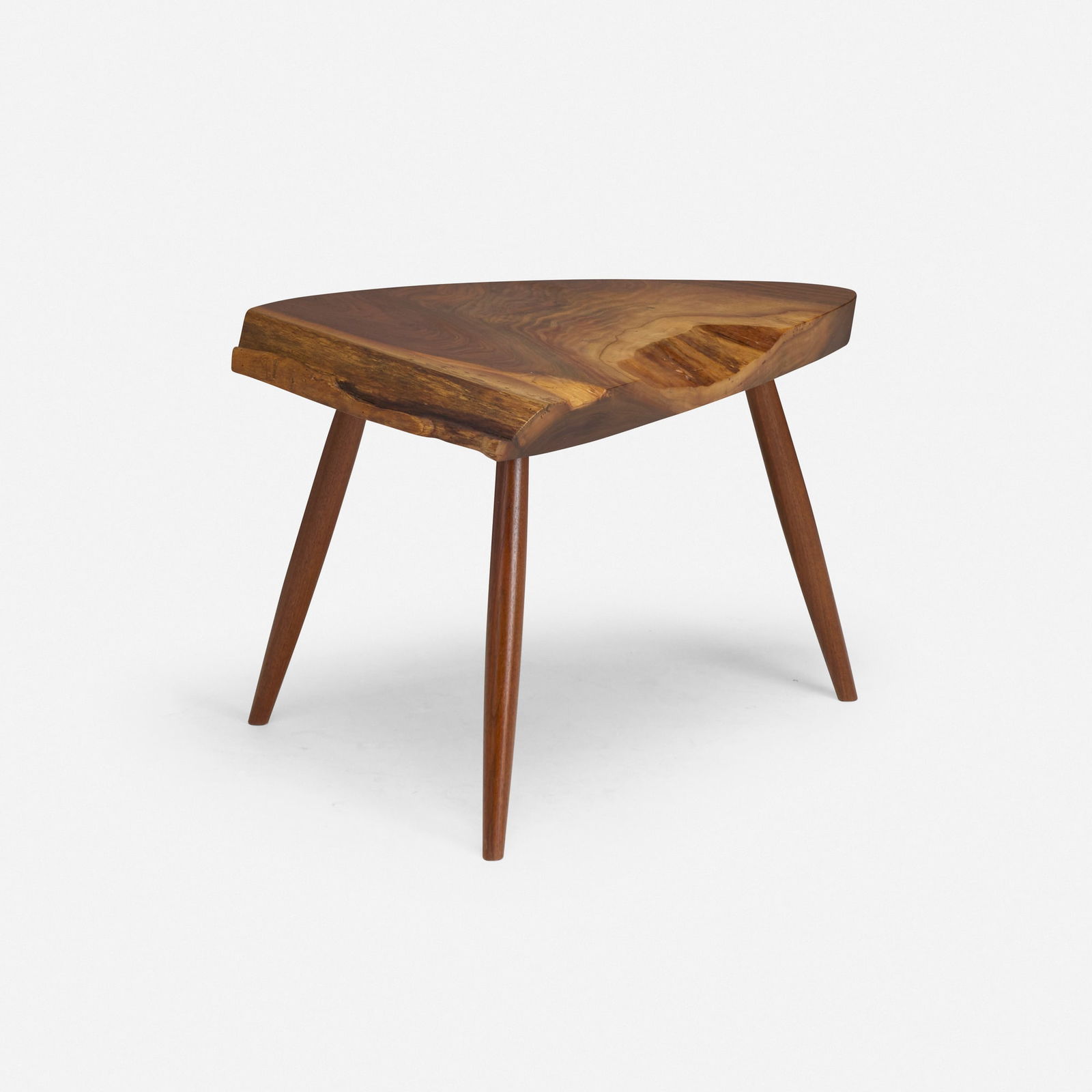 Mira Nakashima, Wepman occasional table: Mira Nakashima Wepman occasional table Nakashima StudioUSA, 2021American black walnut 17 h x 24.5 w x 20 d in (43 x 62 x 51 cm) Table features a single slab crotch top with free edge and