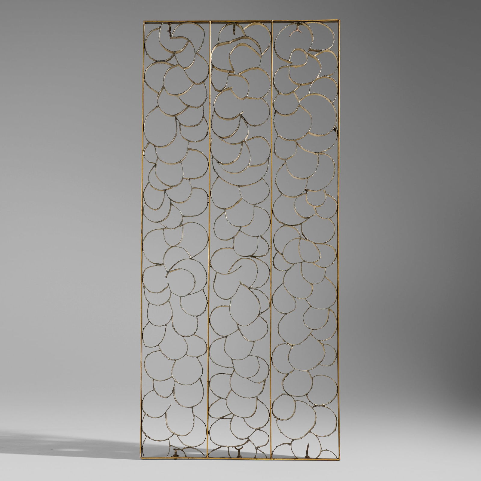 Paul Evans, Rare room divider: Paul Evans Rare room divider Paul Evans StudioUSA, c. 1965torch-cut, welded, enameled and gilt steel 93.75 h x 42 w x 2 d in (238 x 107 x 5 cm) Provenance: David Rago Au