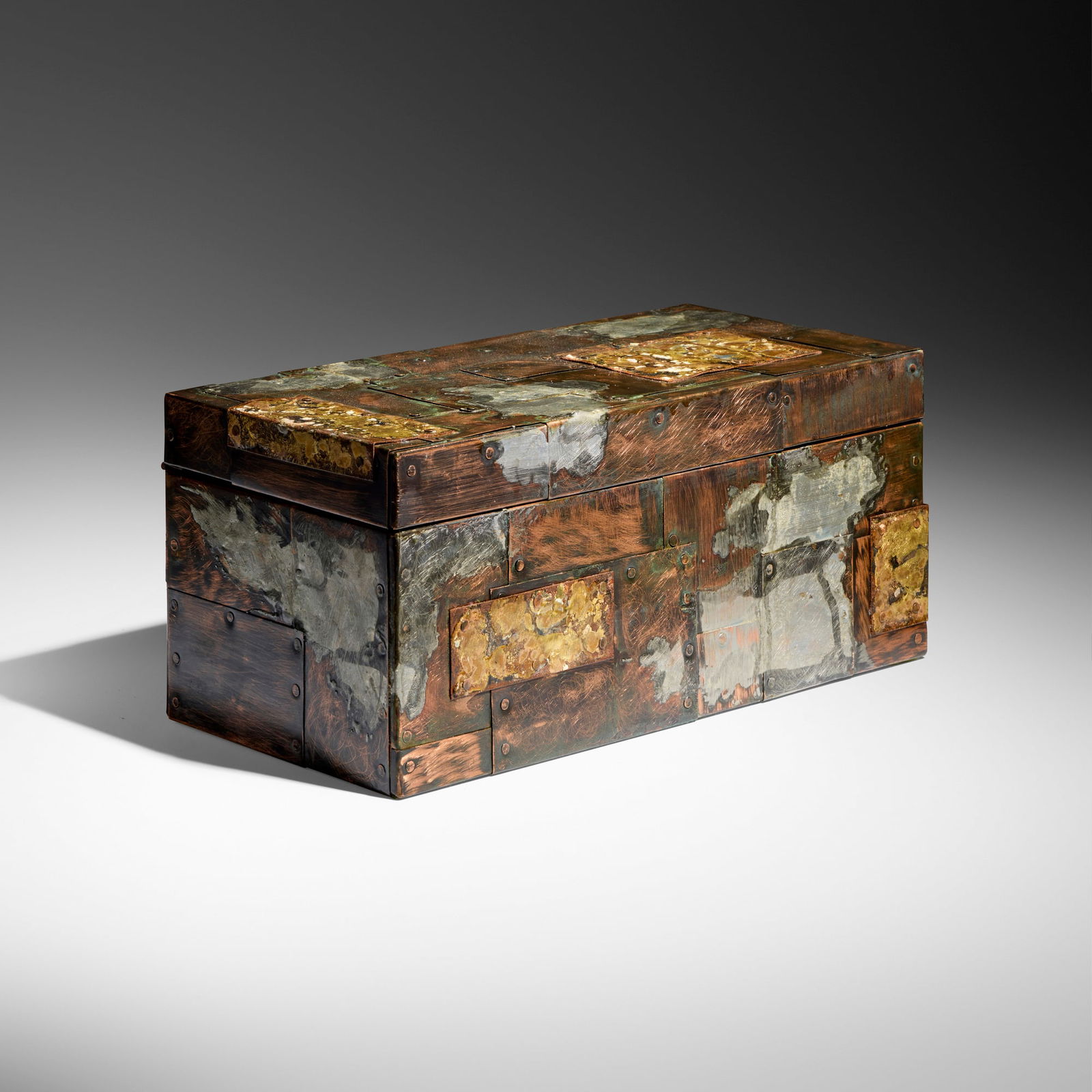 Paul Evans, Rare Patchwork hinged box: Paul Evans Rare Patchwork hinged box Paul Evans StudioUSA, c. 1965patinated copper, bronze, pewter 7.25 h x 16.25 w x 8.25 d in (18 x 41 x 21 cm) Provenance: The Artist