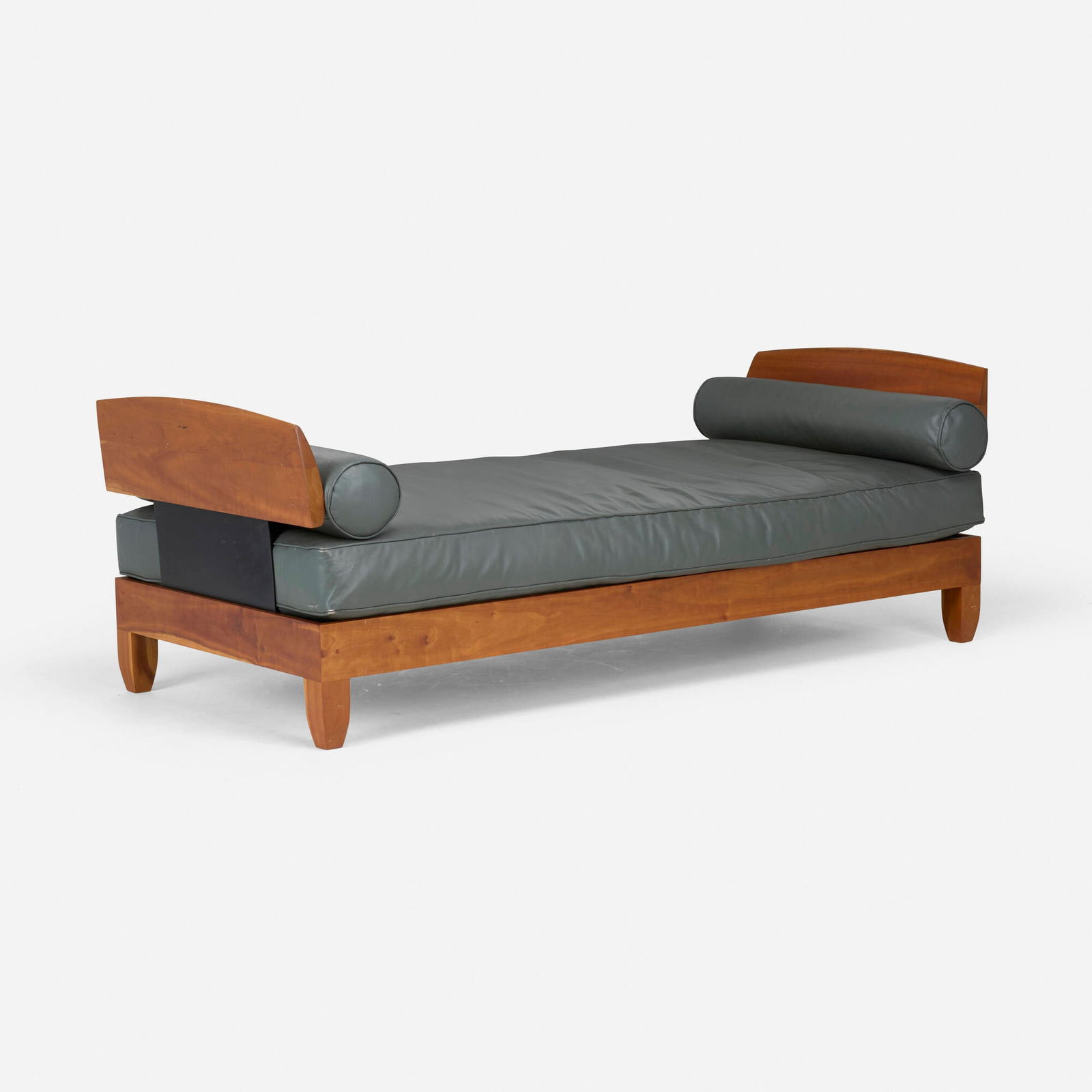 Chris Lehrecke, Daybed: Chris Lehrecke Daybed USA, c. 1990walnut, leather upholstery, composite 29.25 h x 83.25 w x 37 d in (74 x 211 x 94 cm) Provenance: Collection of Peter T. Joseph and Wendy Evan
