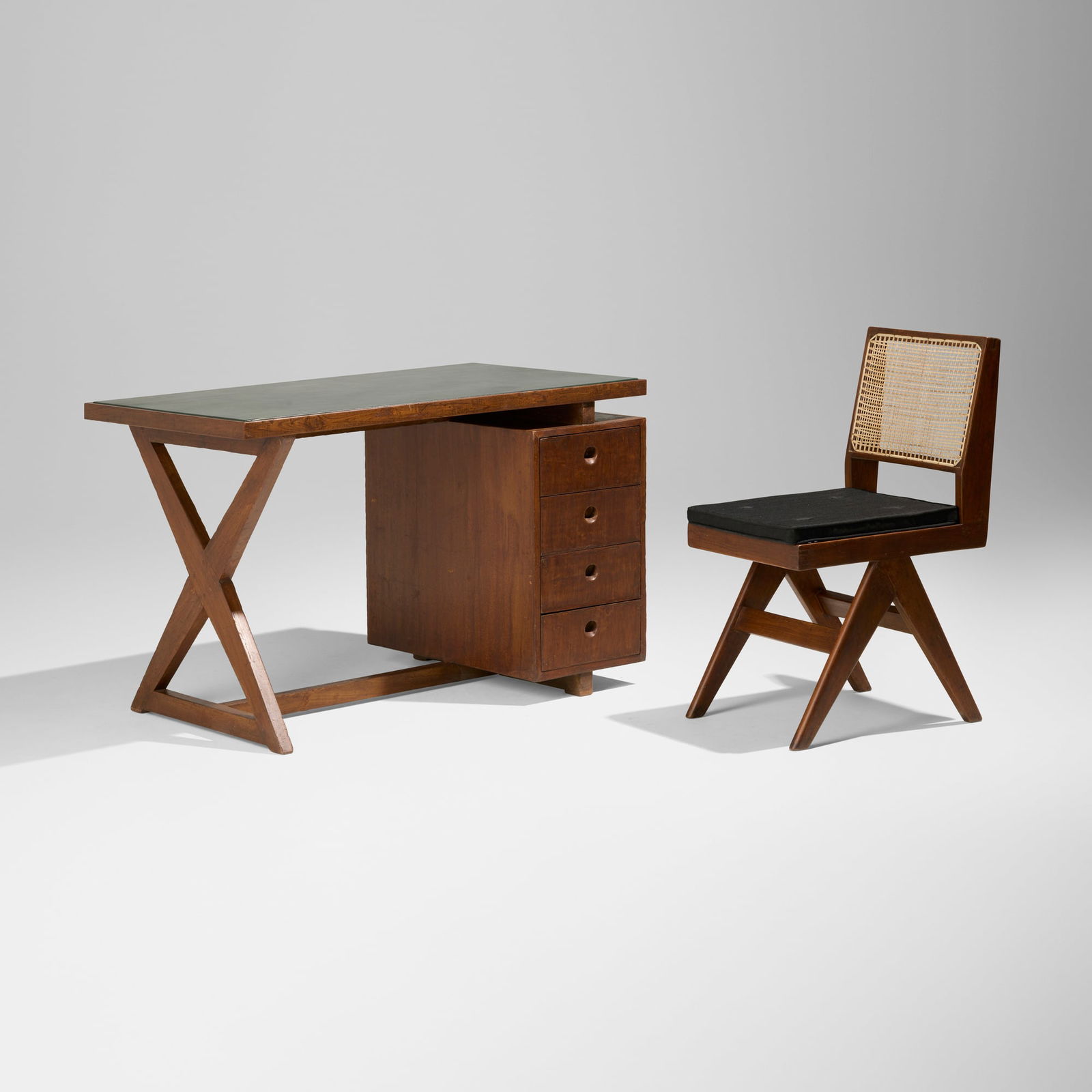 Pierre Jeanneret, X-Leg desk and chair from Chandigarh: Pierre Jeanneret X-Leg desk and chair from Chandigarh France/India, c. 1955-60teak, leather, cane, upholstery desk: 29.75 h x 48 w x 28.25 d in (76 x 122 x 72 cm) chair: 34 h x 18 w x 20.25 d in (