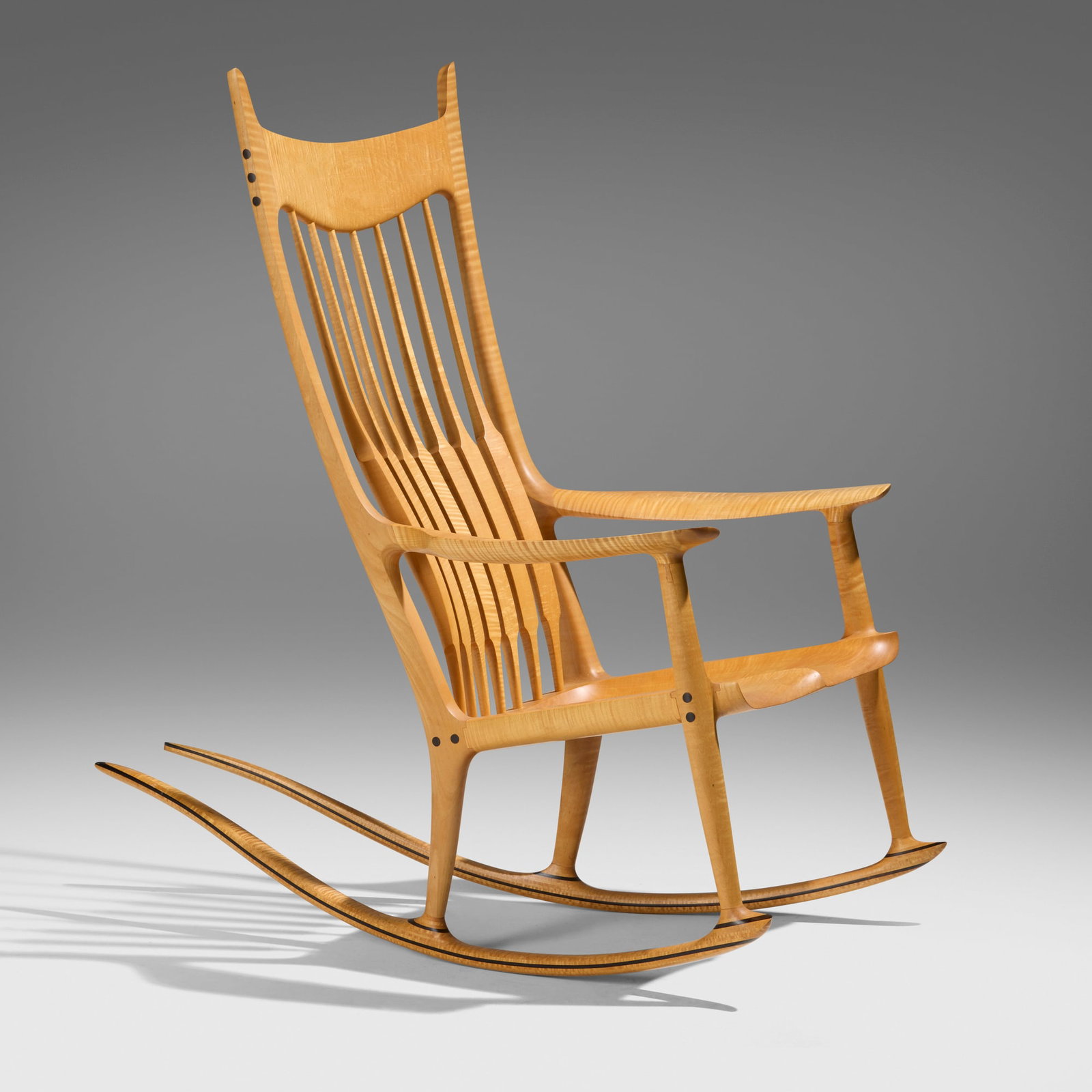 Sam Maloof, Rocking chair: Sam Maloof Rocking chair USA, 1991fiddleback maple, ebony 47.5 h x 27 w x 45 d in (121 x 69 x 114 cm) Carved signature, date and number to underside 'No. 47 1991 Sam Maloof F.A.C.C. ?'.