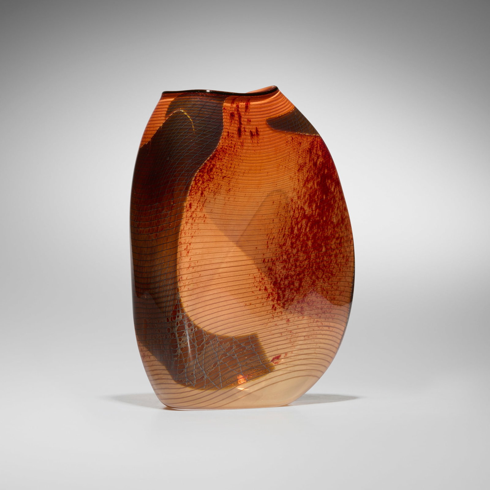 William Morris, Light vessel: William Morris Light vessel 1981hand-blown glass 10.75 h x 6.75 w x 4.75 d in (27 x 17 x 12 cm) Etched signature and date to base 'William Morris 1981'. Provenance: Hok
