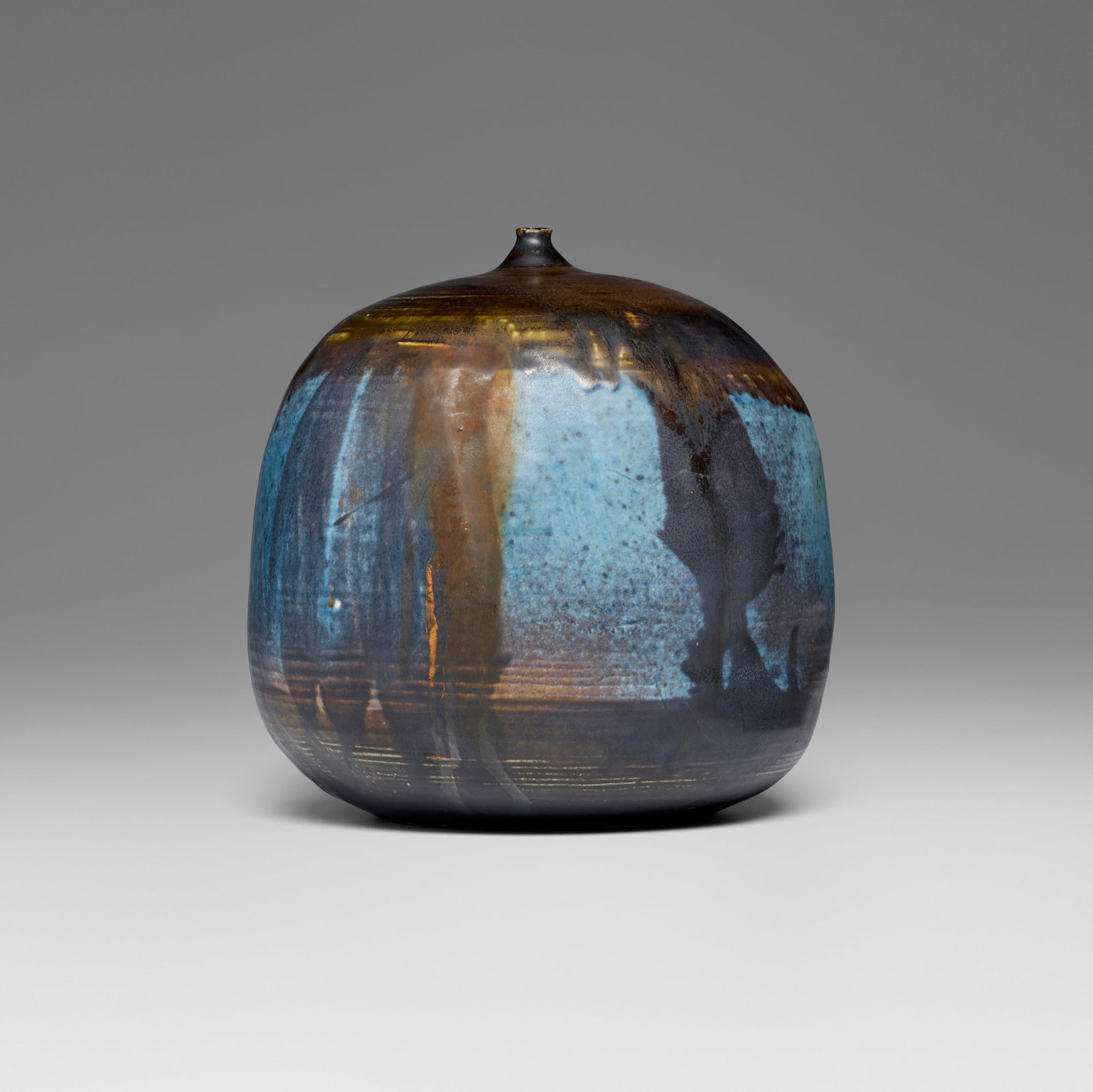 Toshiko Takaezu, Closed Form: Toshiko Takaezu Closed Form c. 1970glazed porcelain 7.5 h x 8 w x 7.5 d in (19 x 20 x 19 cm) Incised signature to underside 'TT'. Provenance: Jeffrey Spahn Gallery, San