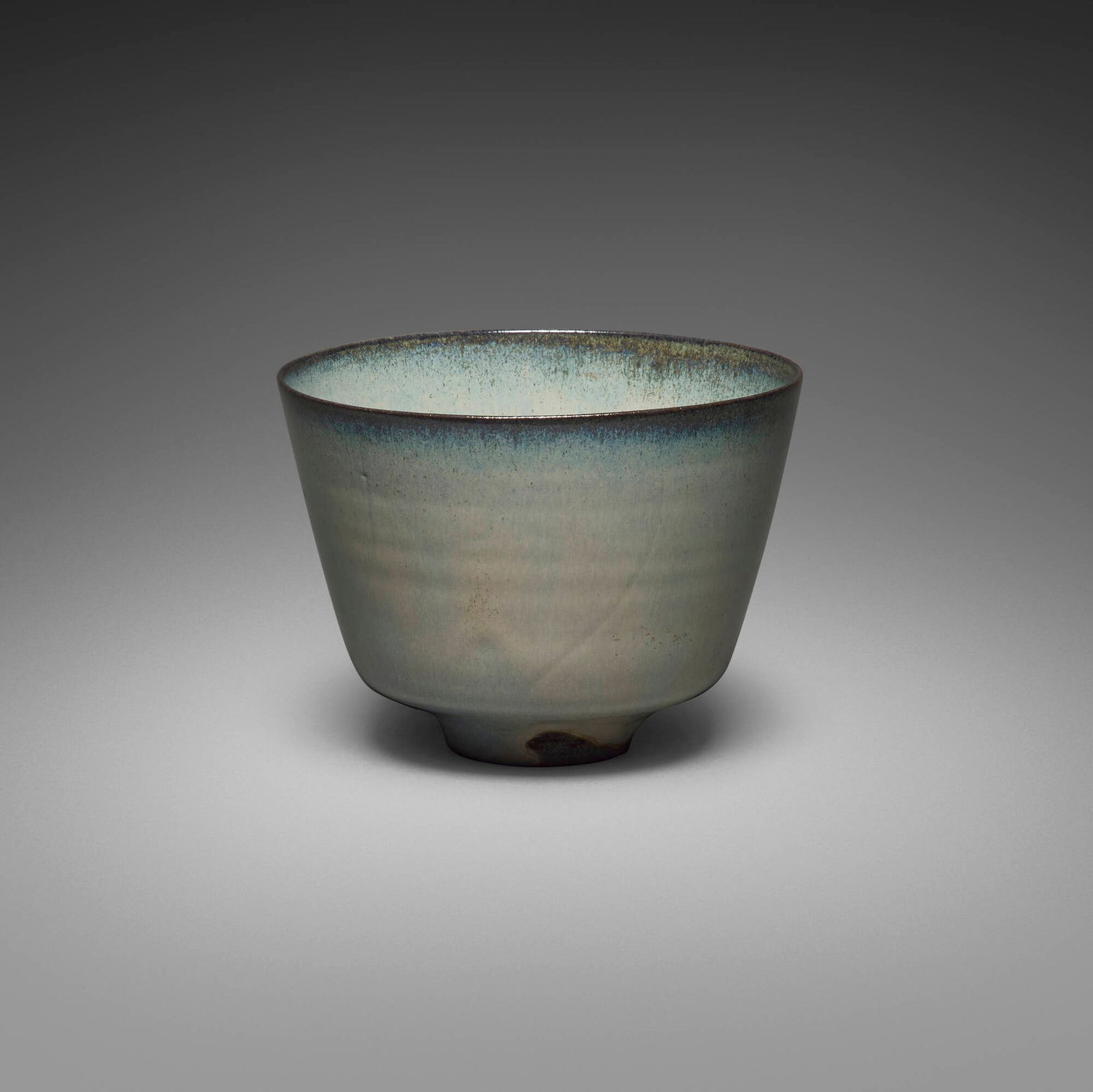 Gertrud and Otto Natzler, Bowl with straight sides: Gertrud and Otto Natzler Bowl with straight sides 1965earthenware with Blue Gray Celadon RG Reduction Fired glaze with melt fissures 4 h x 5.5 dia in (10 x 14 cm) Signed to underside 'Natzler'