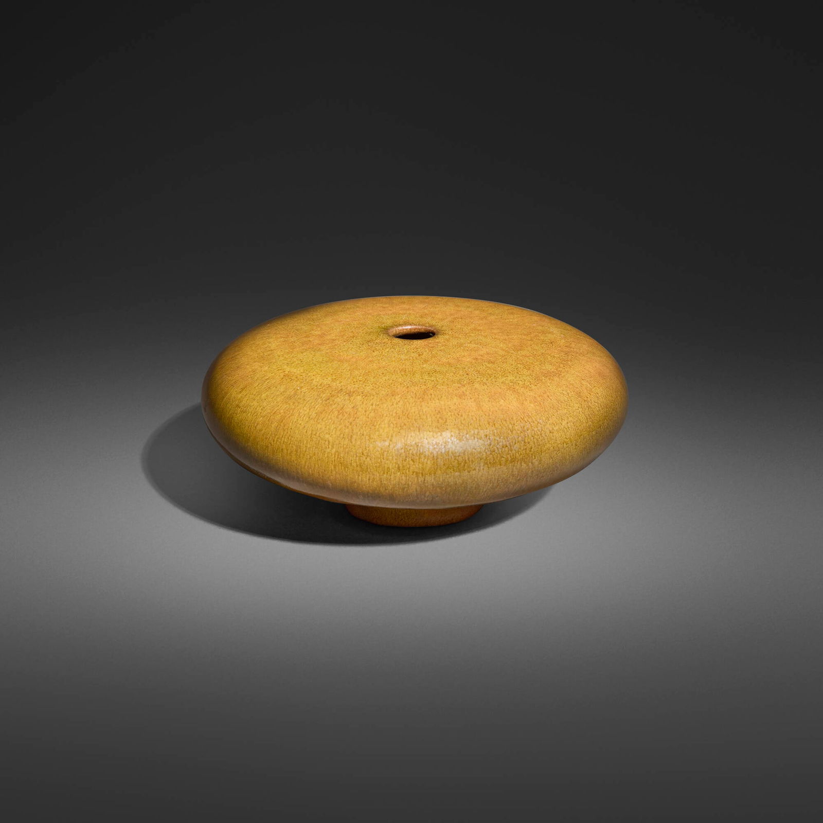 Gertrud and Otto Natzler, Squat closed form: Gertrud and Otto Natzler Squat closed form 1966earthenware with Mustard Yellow Hare's Fur glaze 2.75 h x 6.125 dia in (7 x 16 cm) Signed to underside 'Natzler' with archive number 'N845' and r