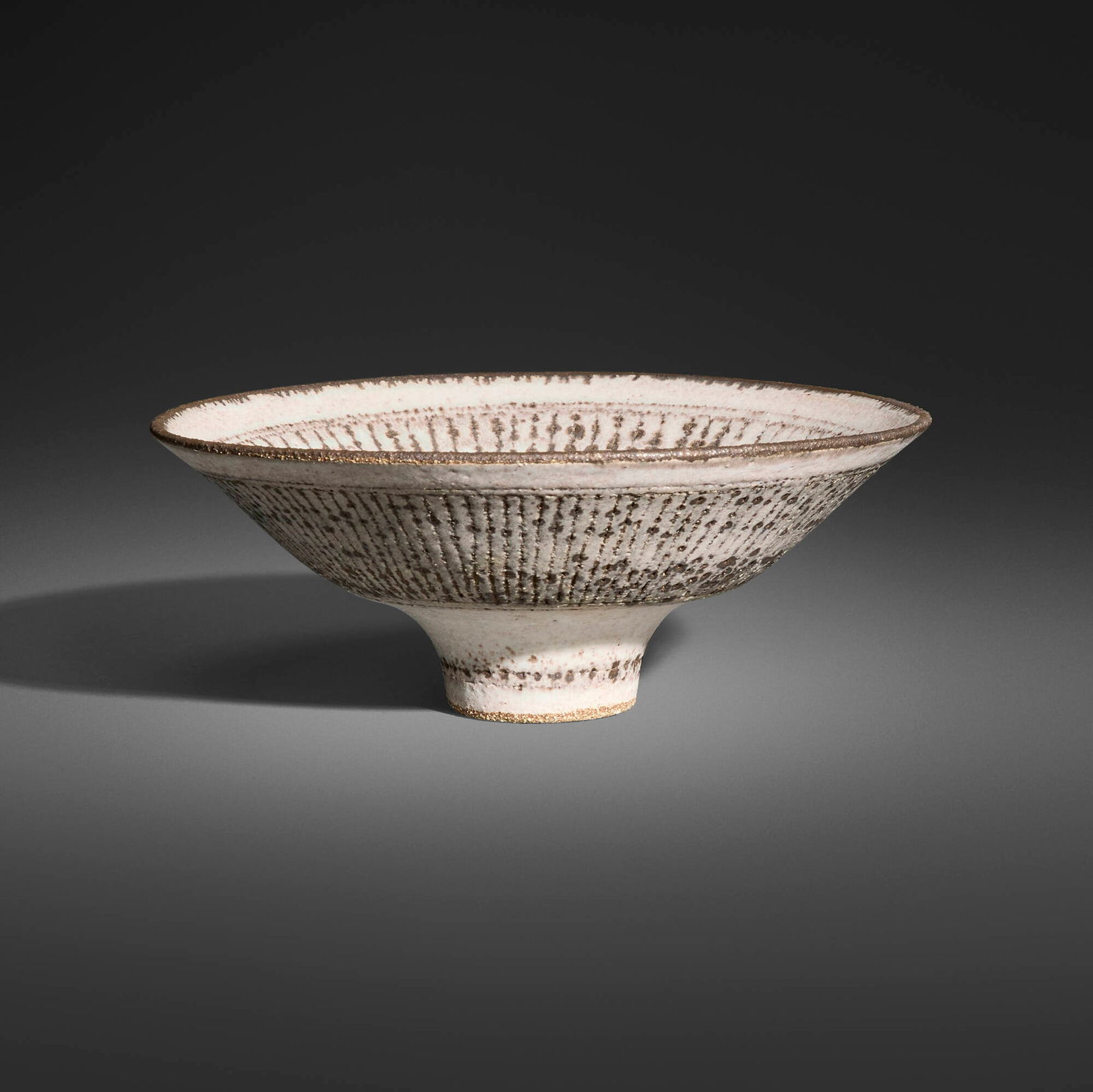 Lucie Rie, New Knitted footed bowl: Lucie Rie New Knitted footed bowl c. 1978glazed stoneware 3 h x 7.75 dia in (8 x 20 cm) Impressed artist's seal to underside. Provenance: Natzler Family Trust