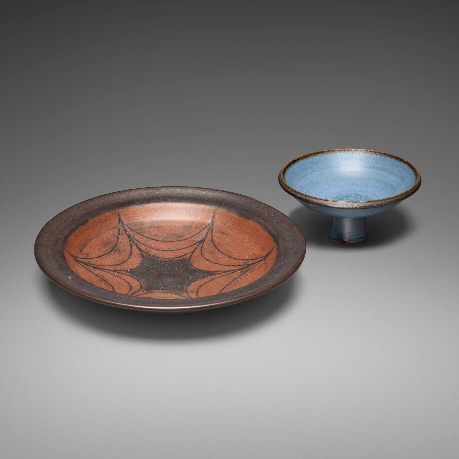 Harrison McIntosh, Low bowl and footed bowl: Harrison McIntosh Low bowl and footed bowl c. 1965glazed stoneware 1.875 h x 9.75 dia in (5 x 25 cm) 2.75 h x 5.5 dia in (7 x 14 cm) Impressed signature to underside of each example 'HM'. P