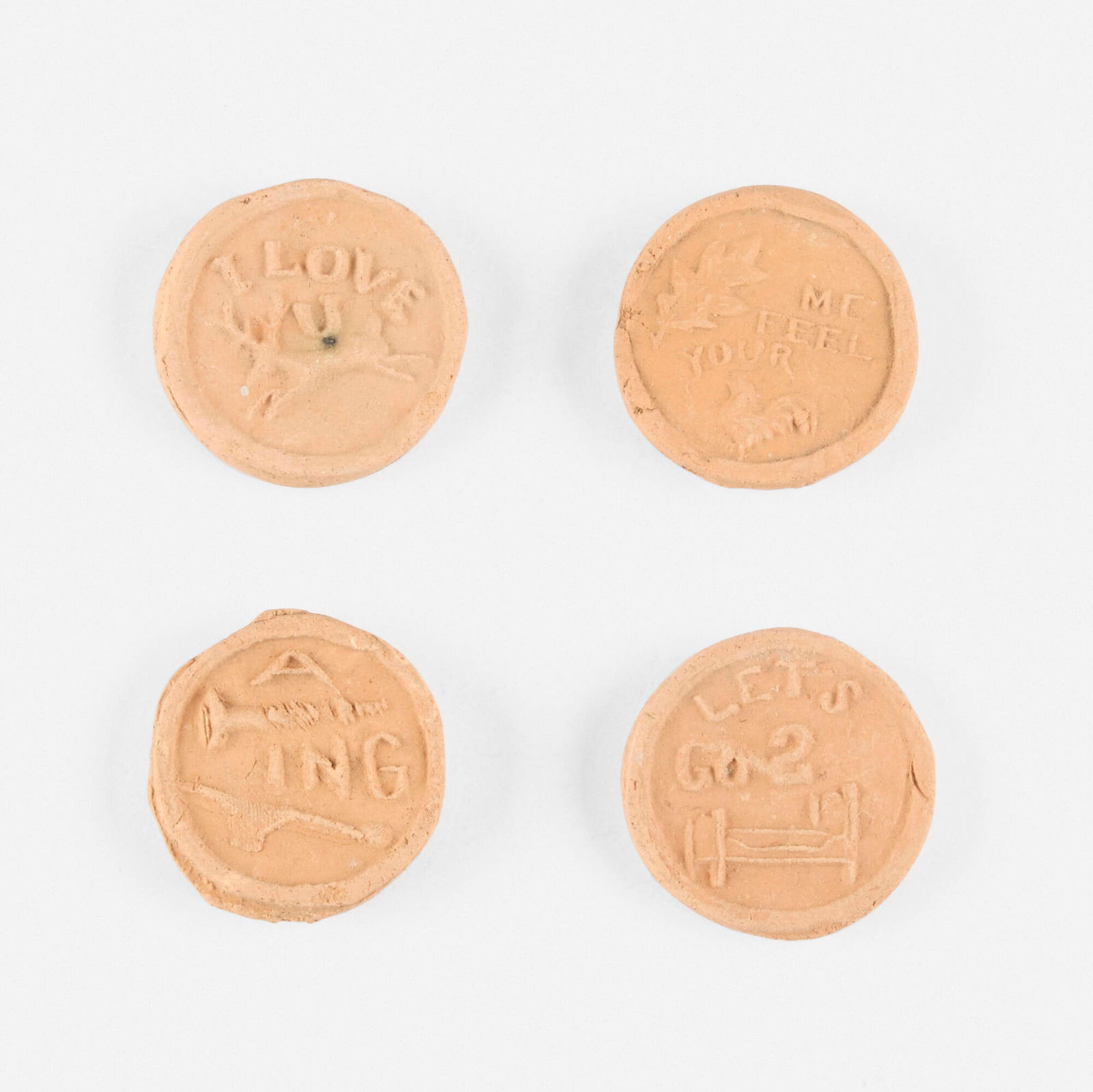 George E. Ohr, Collection of four brothel tokens: George E. Ohr Collection of four brothel tokens USA, c. 1900 bisque earthenware each: 1.25 dia in (3 cm) Provenance: Estate of Martin and Estelle Shack This work will ship from Lambertville, New