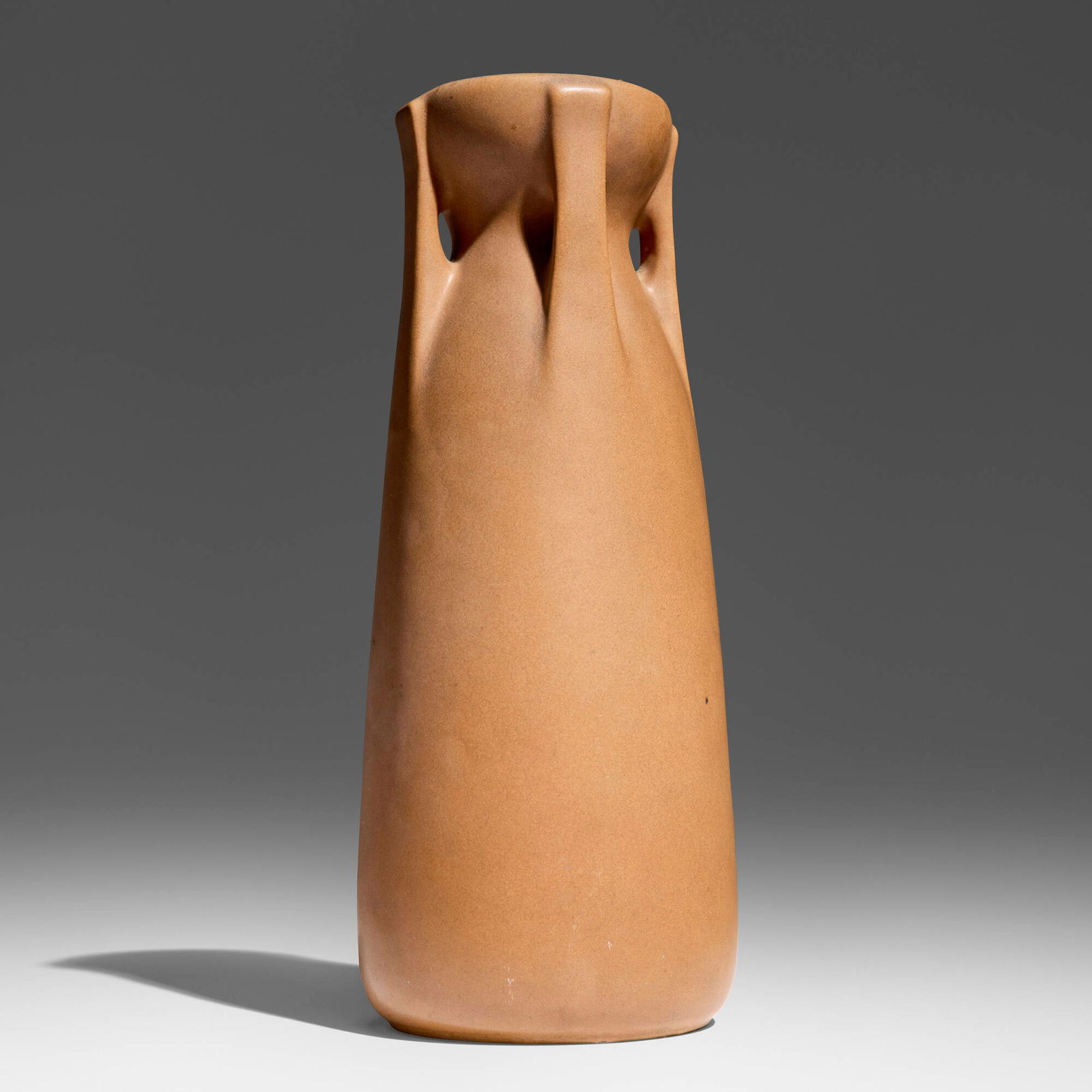 William Bryce Mundie for Teco Pottery, Tall vase, model 269: William Bryce Mundie for Teco Pottery Tall vase, model 269 USA glazed earthenware 11 h x 4.25 dia in (28 x 11 cm) Vase features four buttressed handles. Impressed manufacturer's mark to underside