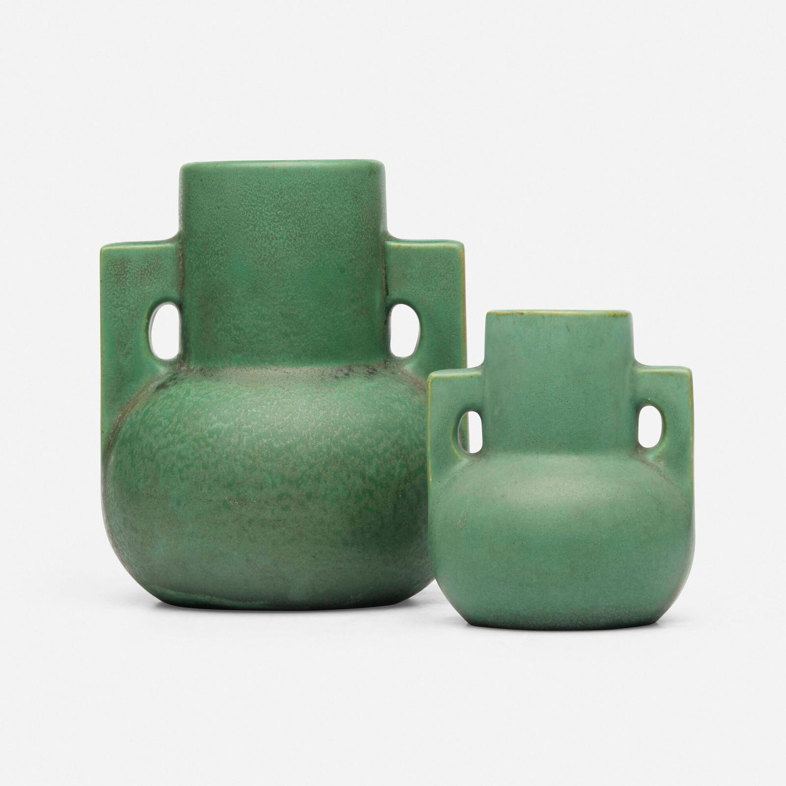 William Day Gates for Teco Pottery, Vases, set of two: William Day Gates for Teco Pottery Vases, set of two USA, c. 1904 glazed earthenware 5.5 h x 4.5 dia in (14 x 11 cm) 3.75 h x 3 dia in (10 x 8 cm) Set is comprised of models 440 and 425. Impressed