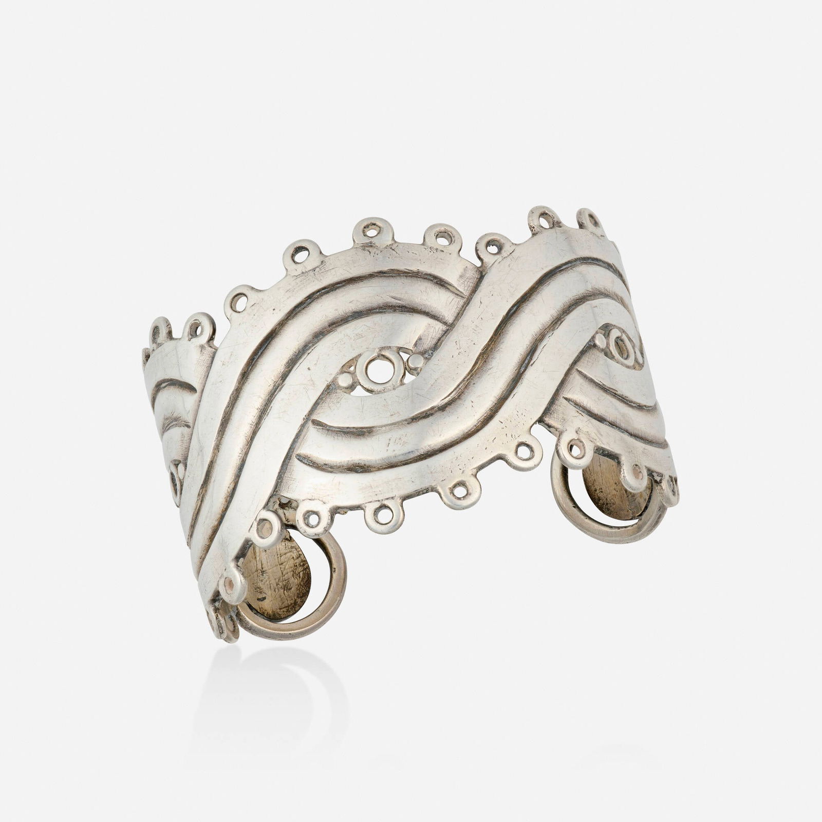 William Spratling, 'Mask' silver cuff bracelet (1 of 3)