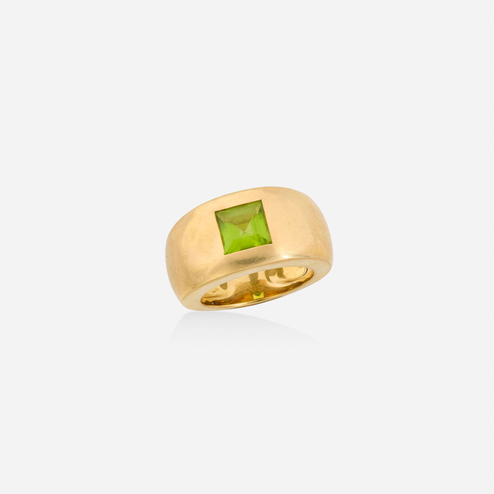 Chaumet, Peridot and gold ring: Chaumet Peridot and gold ring Set with a square-cut peridot 18k yellow gold Signed Chaumet Paris, numbered Ring size 5.75; Gross weight 7.9 dwts This work will ship from Lamb