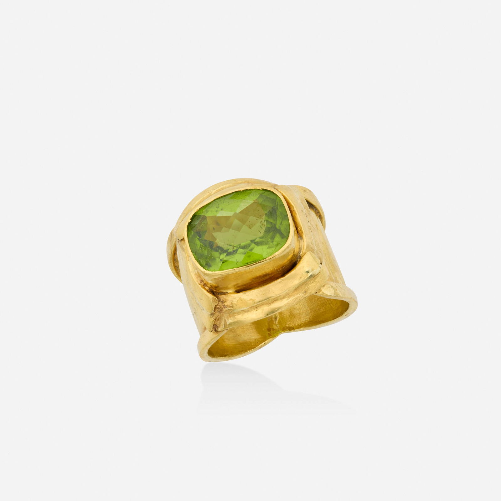 Margaret Ellis, Peridot and gold ring: Margaret Ellis Peridot and gold ring Set with a checkerboard-cut peridot 22k yellow gold Signed Ellis Ring size 6.25; Gross weight 9.4 dwts This work will ship from Lambertvi