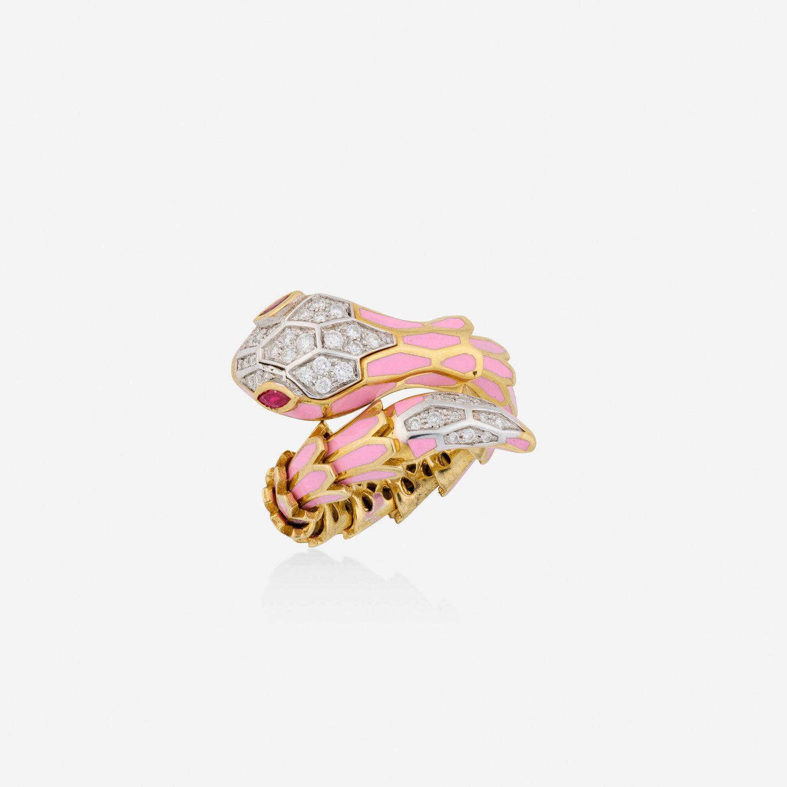 Alexis NY, Diamond, ruby, and enamel ring: Alexis NY Diamond, ruby, and enamel ring Designed as a coiled snake with pink enamel scales, round brilliant-cut diamond head and marquise-cut ruby eyes 18k yellow gold and sterling silver Signed Alex