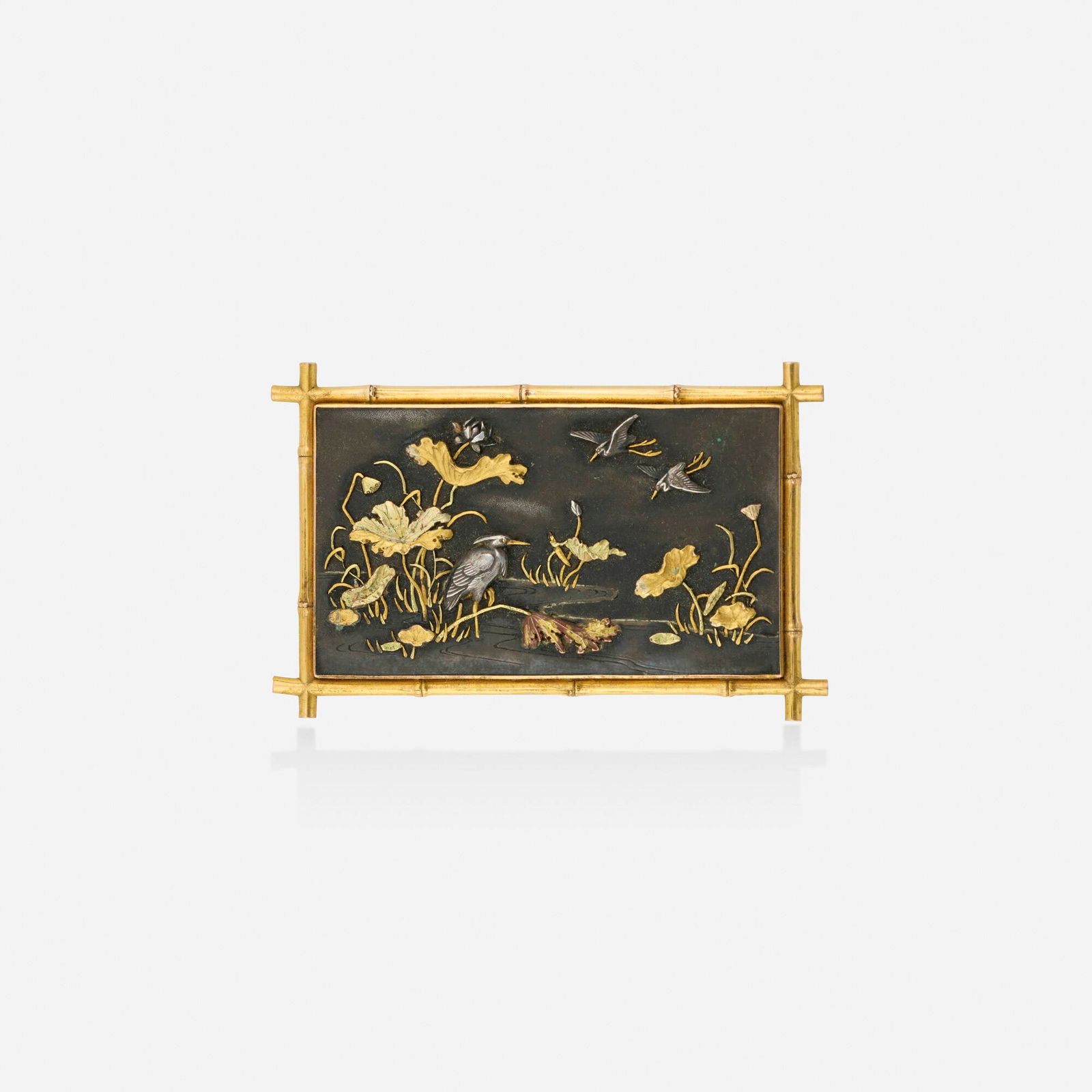 Shakudo brooch: Shakudo brooch Depicting several cranes and water lilies, framed by bamboo Gold, copper, and silver 2.125 x 1.375 in; Gross weight 15.1 dwts This work will ship from Lambertville, New Jersey.