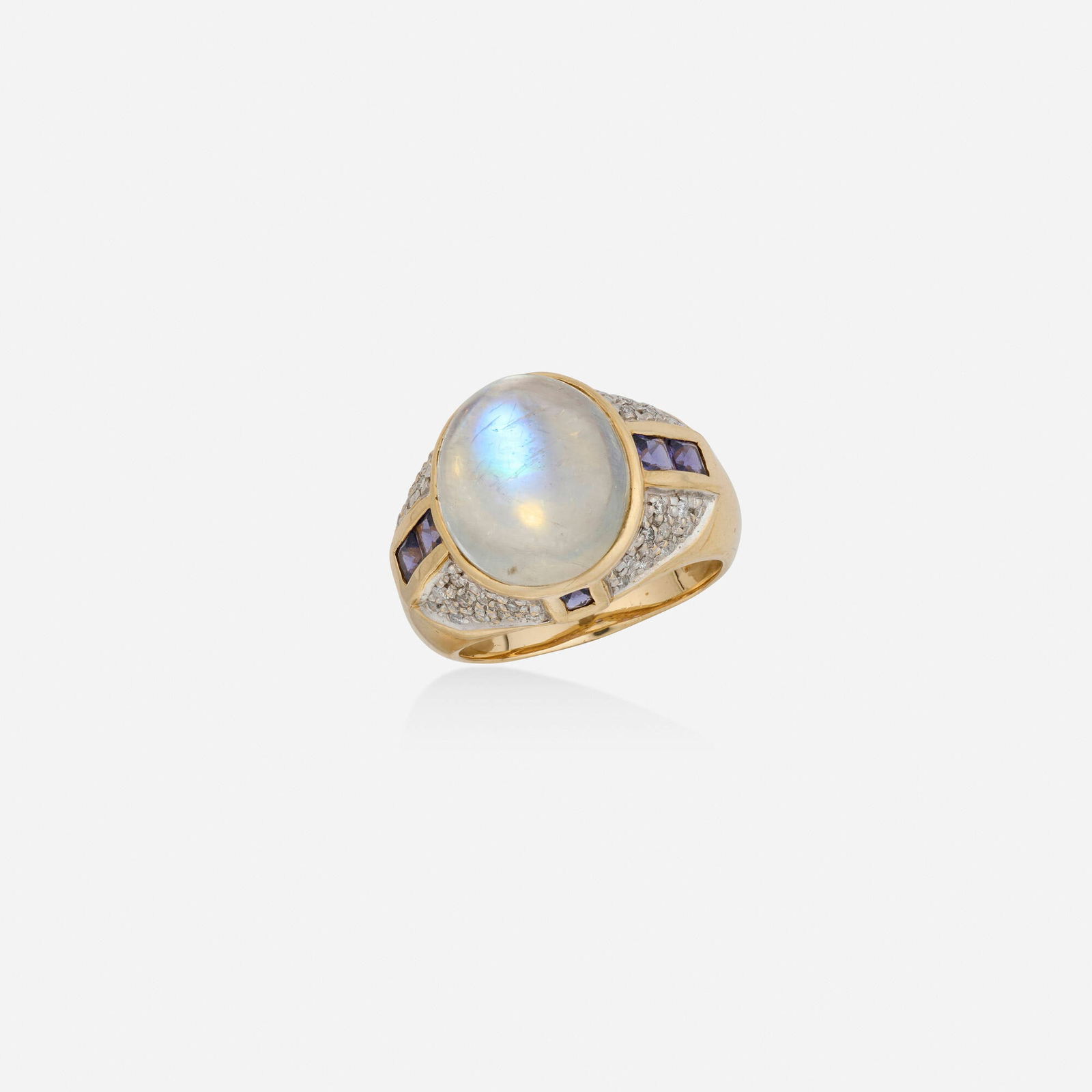 Moonstone, iolite, and diamond ring: Moonstone, iolite, and diamond ring Set with a cabochon moonstone, square-cut iolite, and round brilliant-cut diamonds 14k yellow and white gold Ring size 7; Gross weight 6.0 dwts This work will