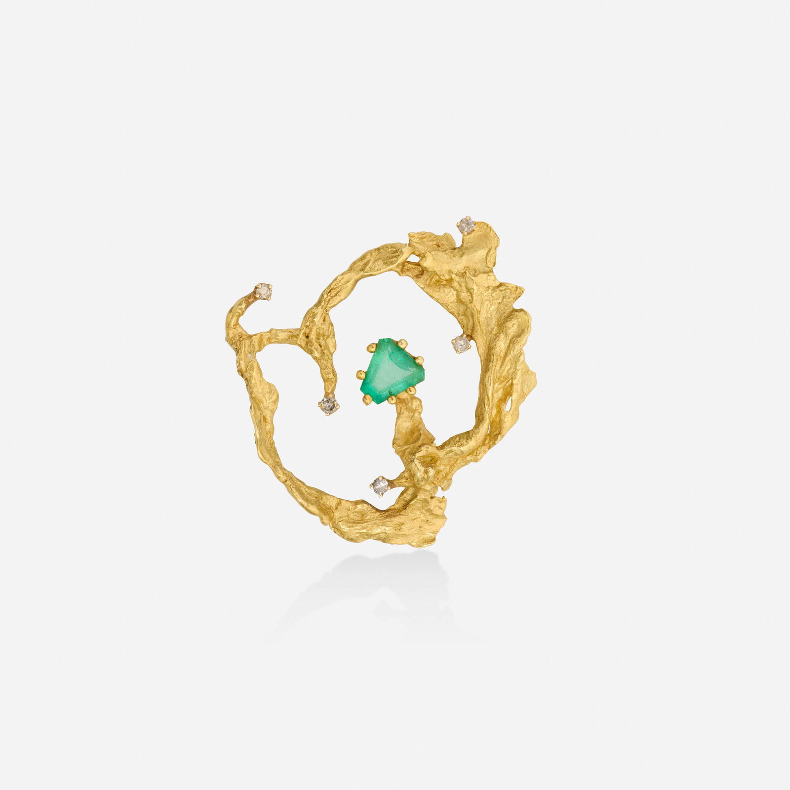 Ed Wiener, Emerald, diamond, and gold brooch: Ed Wiener Emerald, diamond, and gold brooch Of freeform gold, set with a triangular-cut emerald and single-cut diamonds 18k yellow gold Signed Ed Wiener 1.75 x 1.625 in; Gross weight 9.5 dwts
