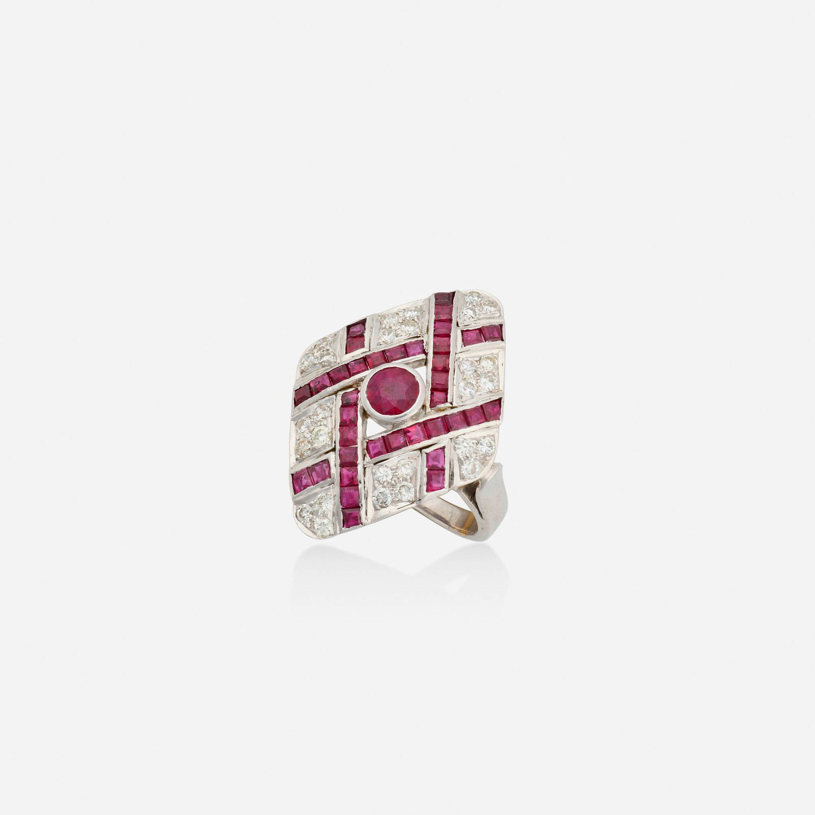Ruby, diamond, and white gold ring: Ruby, diamond, and white gold ring Of woven design, set with round brilliant-cut diamonds, circular and calibre-cut rubies White gold Ring size 5.25; Gross weight 3.8 dwts This work will ship