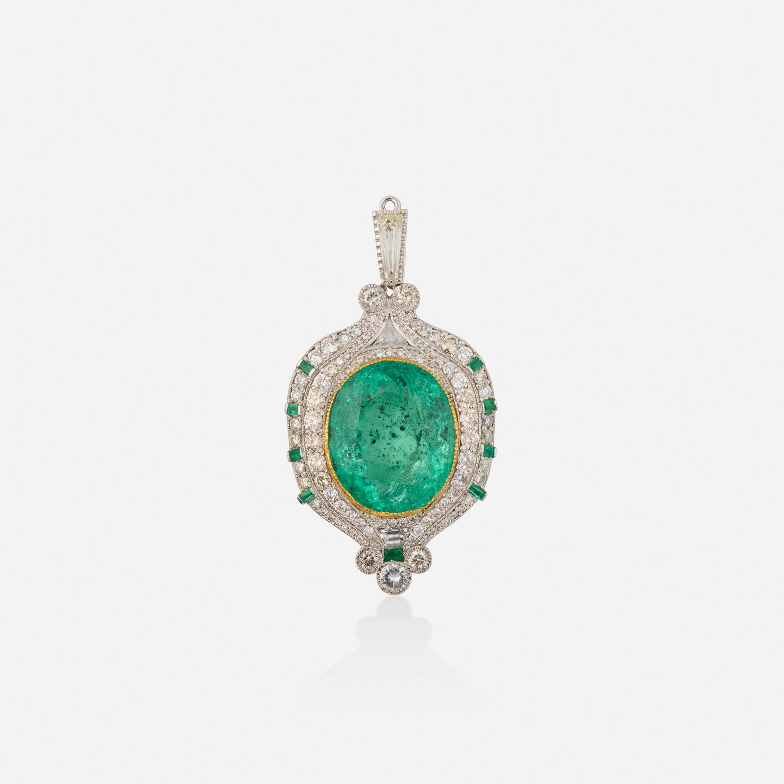 Emerald, diamond, and platinum pendant: Emerald, diamond, and platinum pendant Set with an oval-cut emerald, framed by tapered baguette, triangular, trapezoidal, and round brilliant-cut diamonds and rectangular-cut emeralds Platinum and