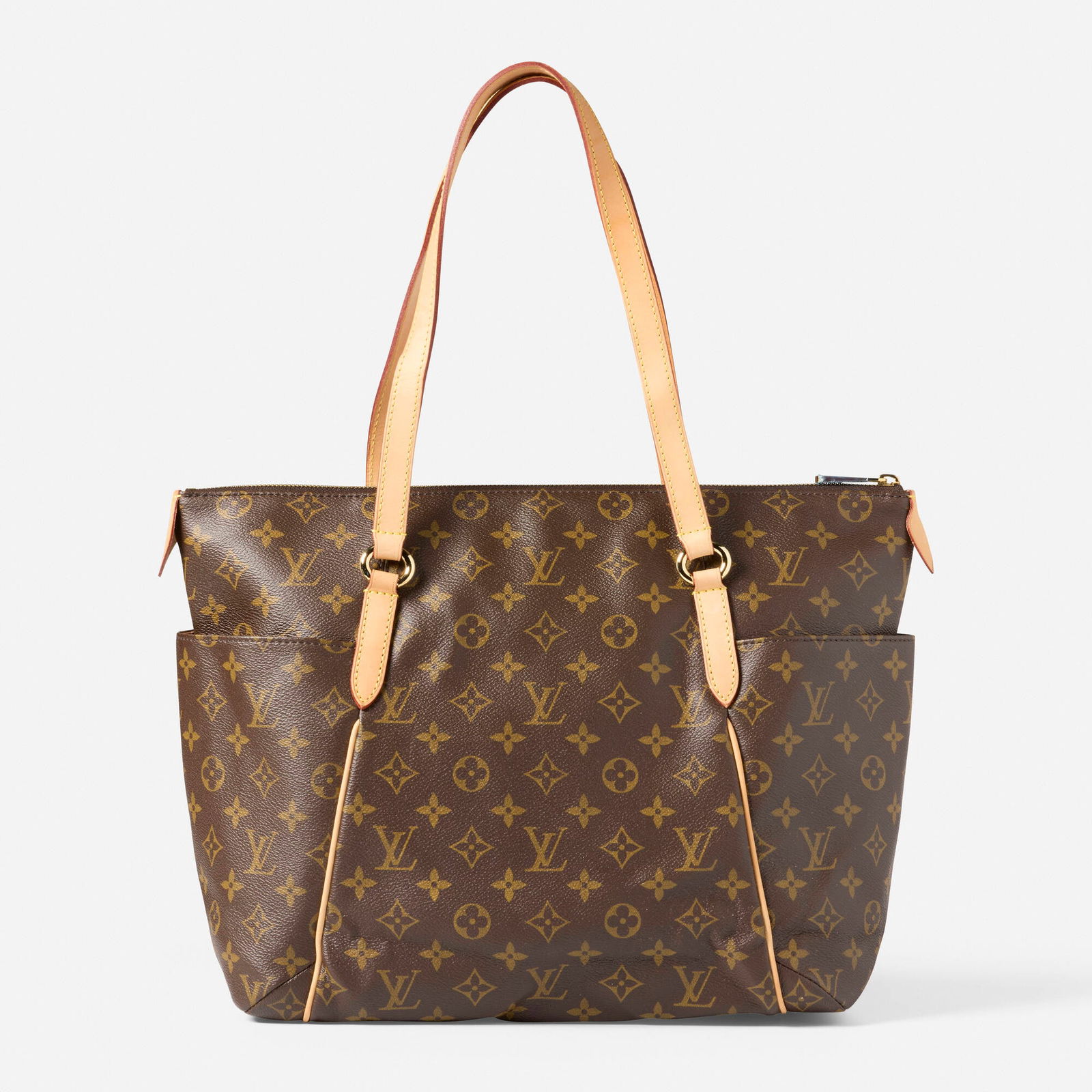 Louis Vuitton, 'Totally MM' tote bag: Louis Vuitton 'Totally MM' tote bag LV Monogram Leather, canvas, metal Signed Louis Vuitton 21 x 17 x 5.50 in Sold with dust bag This work will ship from Lambertville, New Jersey.