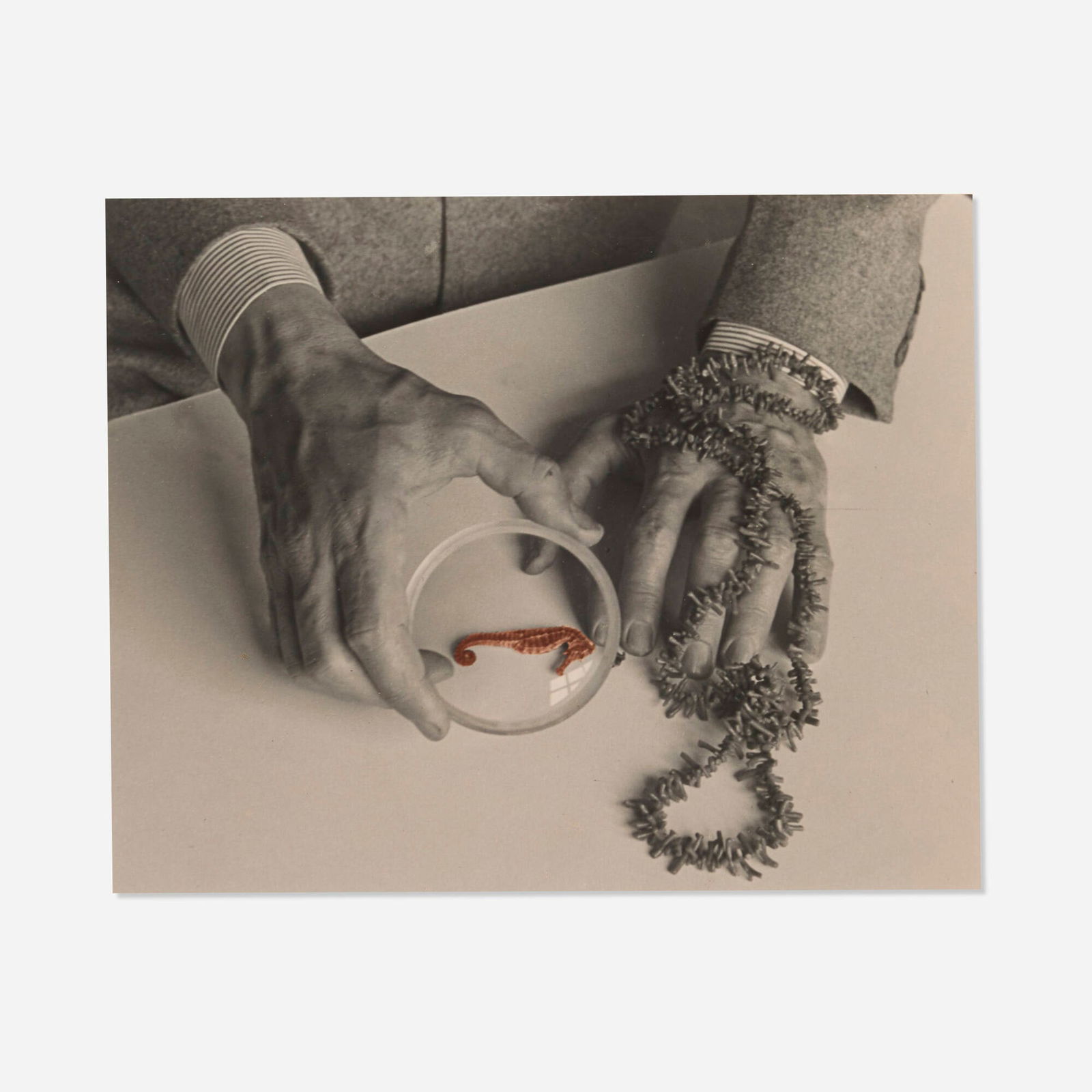 Josef Breitenbach, The Hands of Max Ernst: Josef Breitenbach The Hands of Max Ernst 1942vintage gelatin silver print with hand-coloring image: 7.625 h x 9.5 w in (19 x 24 cm) sheet: 8 h x 9.875 w in (20 x 25 cm) Estate stamp to vers