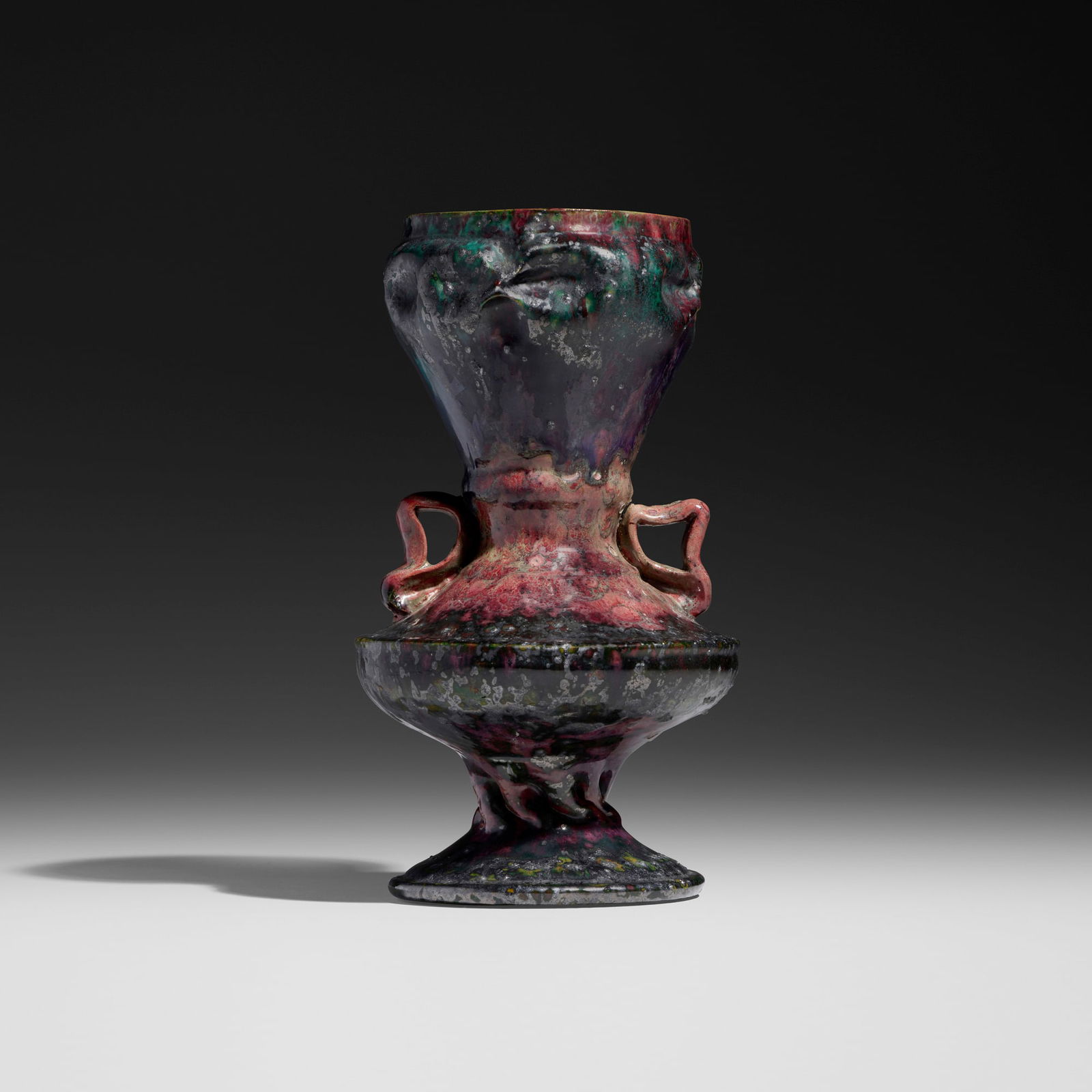 George E. Ohr, Large vase: George E. Ohr Large vase USA, 1897-1900glazed earthenware 9.5 h x 5.25 dia in (24 x 13 cm) Vase features two handles, a dimpled rim, and an in-body twist to the foot with an emerald, gunmetal,