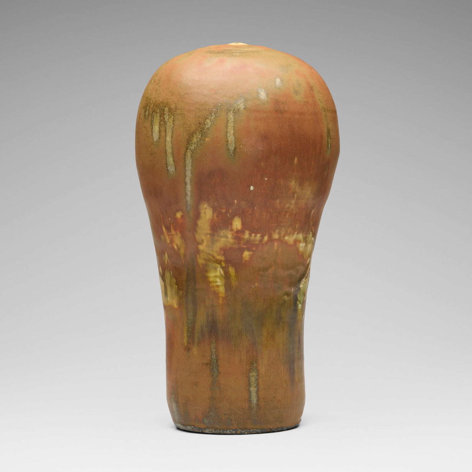 Toshiko Takaezu, Closed Form: Toshiko Takaezu Closed Form c. 1965 glazed porcelain 13.625 h x 7 w x 6.375 d in (35 x 18 x 16 cm) Incised signature to underside 'TT'. Provenance: Private Collection, California Exhibited: