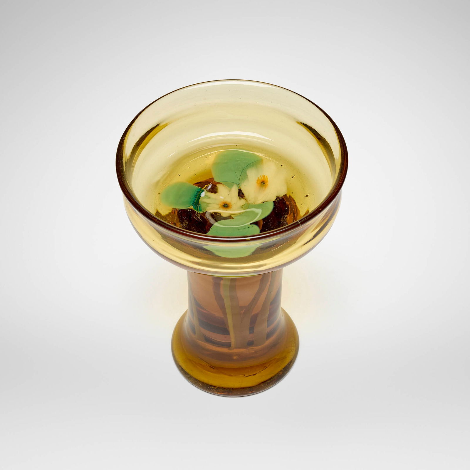 Tiffany Studios, Rare Aquamarine compote with water lilies: Tiffany Studios Rare Aquamarine compote with water lilies USA, c. 1911-12 hand-blown Favrile glass 9 h x 6.625 dia in (23 x 17 cm) A similar example from the esteemed Garden Museum Collection,