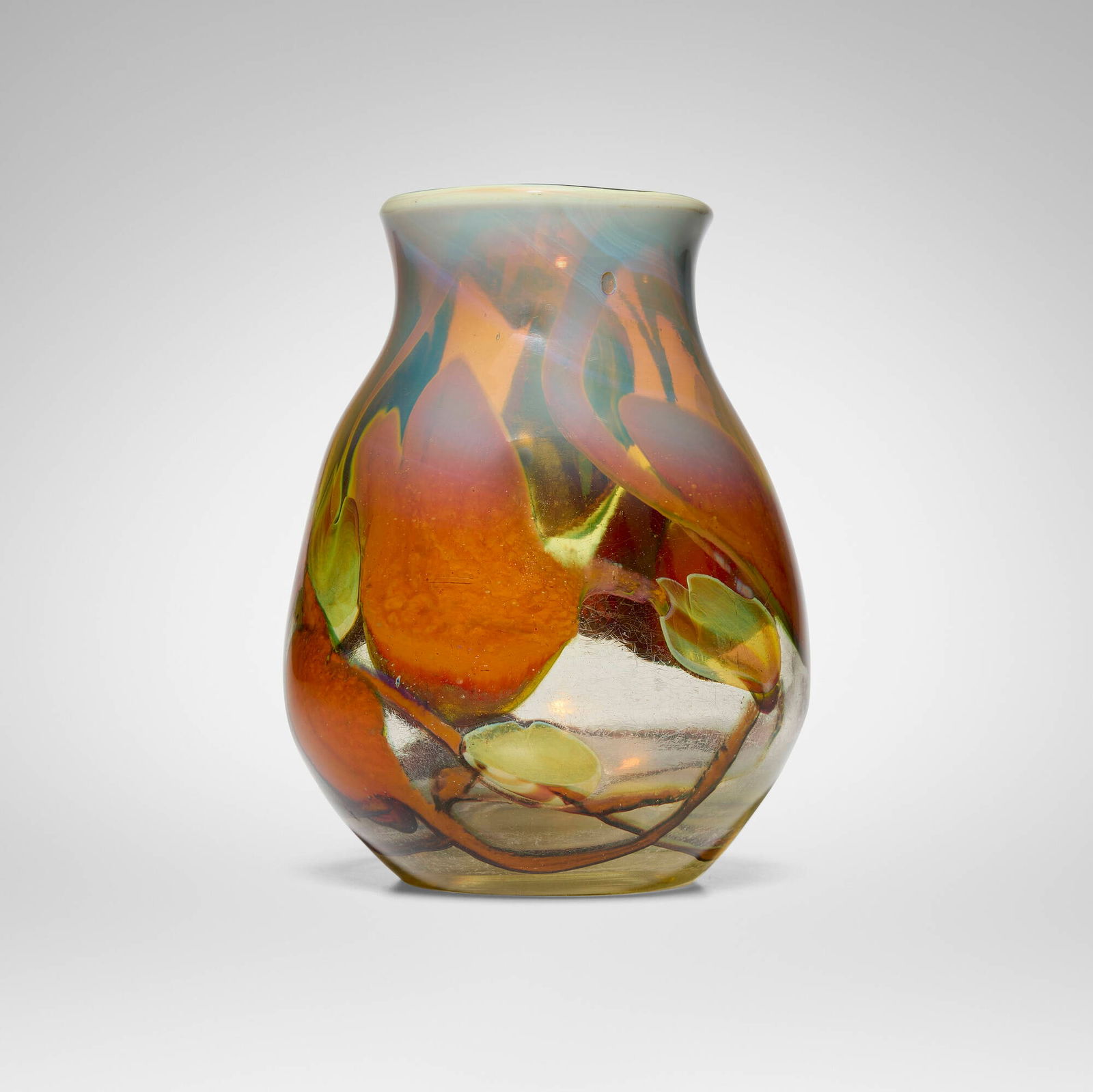 Tiffany Studios, Paperweight vase with cyclamen: Tiffany Studios Paperweight vase with cyclamen USA, c. 1921 hand-blown Favrile glass 6.5 h x 4.75 dia in (17 x 12 cm) Etched to underside '4010P L. C.Tiffany - Favrile'. Provenance: Ray Grover |