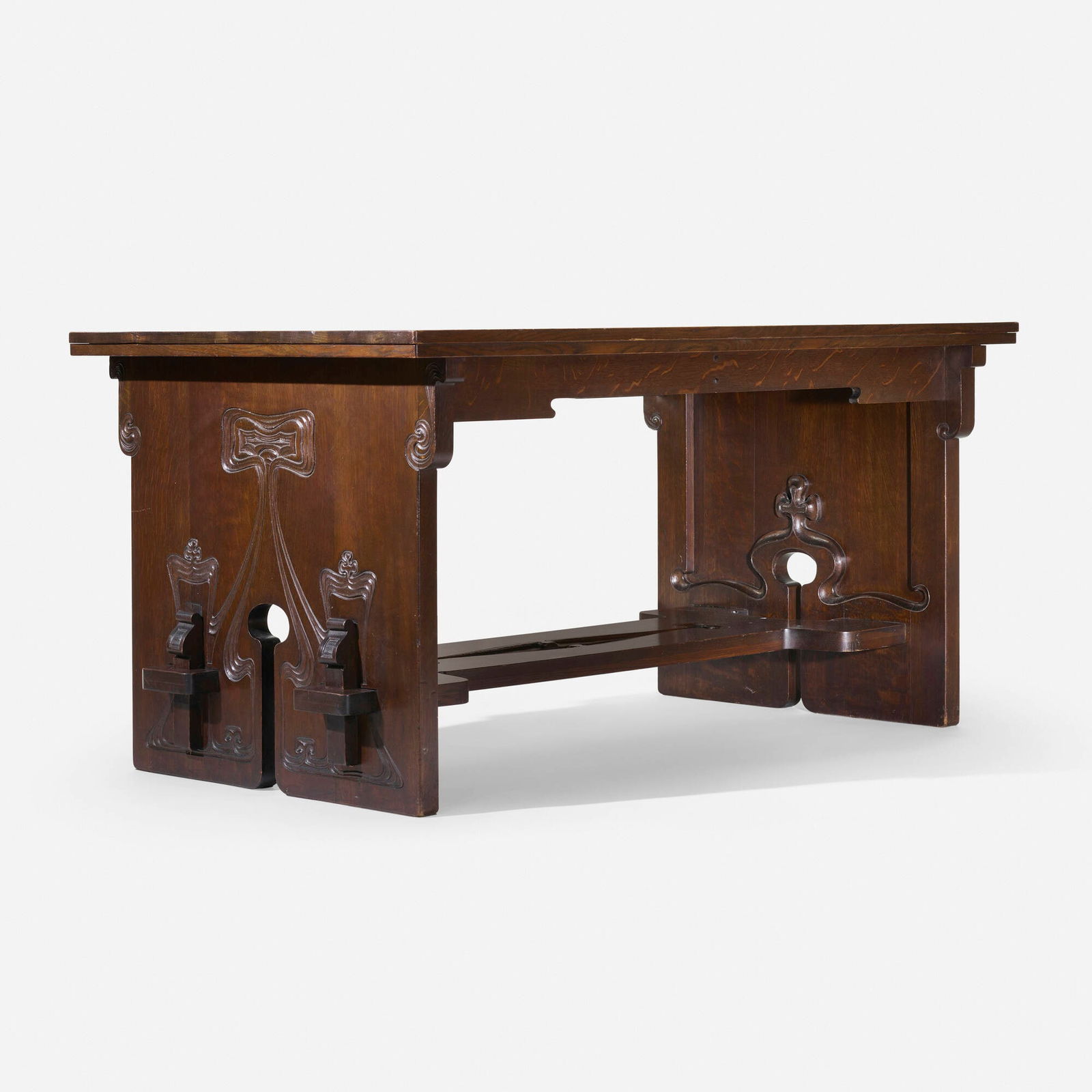Charles Rohlfs, Important library table: Charles Rohlfs Important library table USA, 1907oak 30 h x 60 w x 38 d in (76 x 152 x 97 cm) Carved signature and date to side apron 'R 1907' with saw cipher. Provenance: