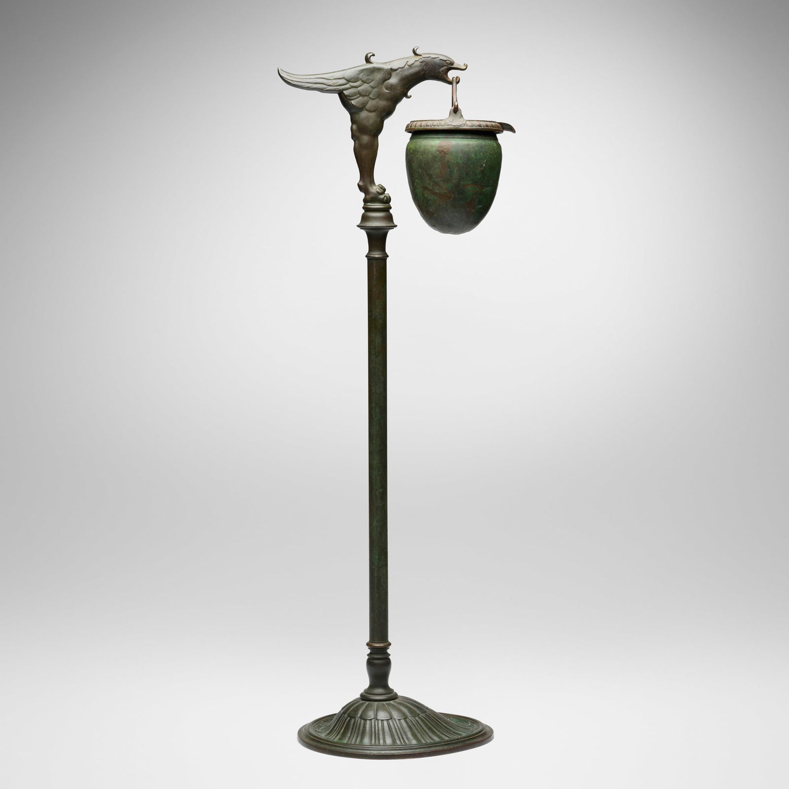 Tiffany Studios, Bird-form smokers' stand: Tiffany Studios Bird-form smokers' stand USA, c. 1910 patinated bronze 31.5 h x 11 w x 8 d in (80 x 28 x 20 cm) Impressed to underside 'TIFFANY STUDIO NEW YORK 2033'. Provenance: Plantation