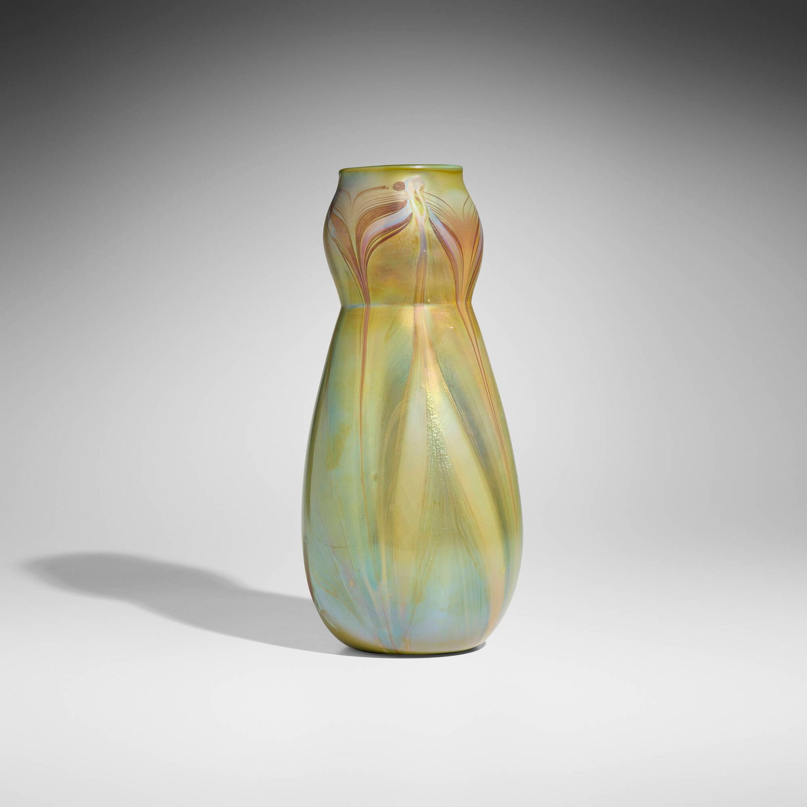 Tiffany Studios, Early pulled-feather vase: Tiffany Studios Early pulled-feather vase USA, c. 1896 hand-blown Favrile glass 16.875 h x 7.75 dia in (43 x 20 cm) A related work, numbered X1208, was sold to the Cincinnati Art Museum in 1897