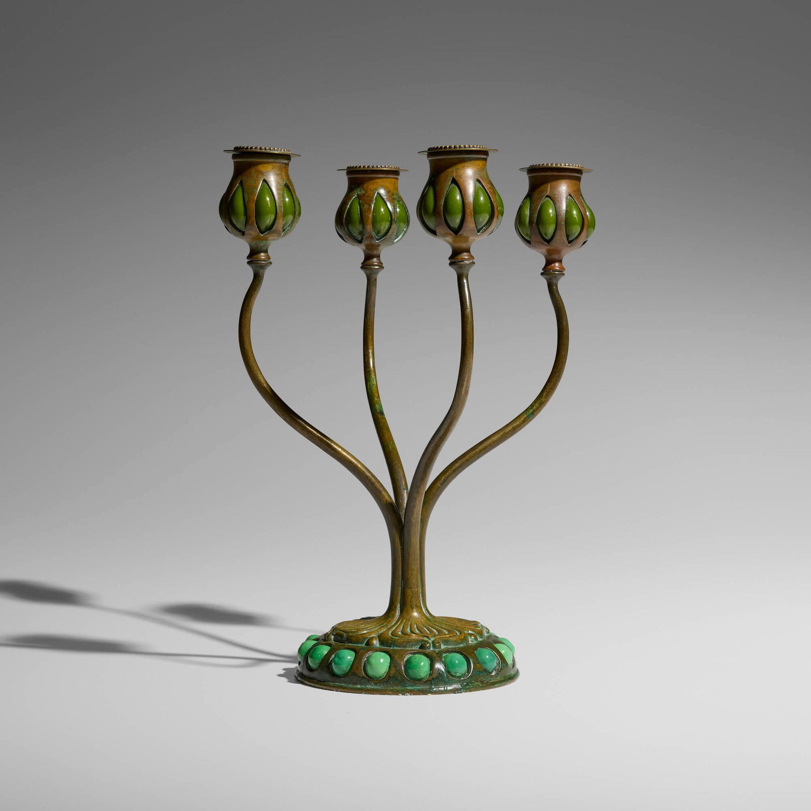 Tiffany Studios, Blown-out candelabrum: Tiffany Studios Blown-out candelabrum USA, c. 1910 patinated bronze, hand-blown glass 12.75 h x 7.5 dia in (32 x 19 cm) Impressed to underside 'TIFFANY STUDIOS NEW YORK S1451'. Provenance: