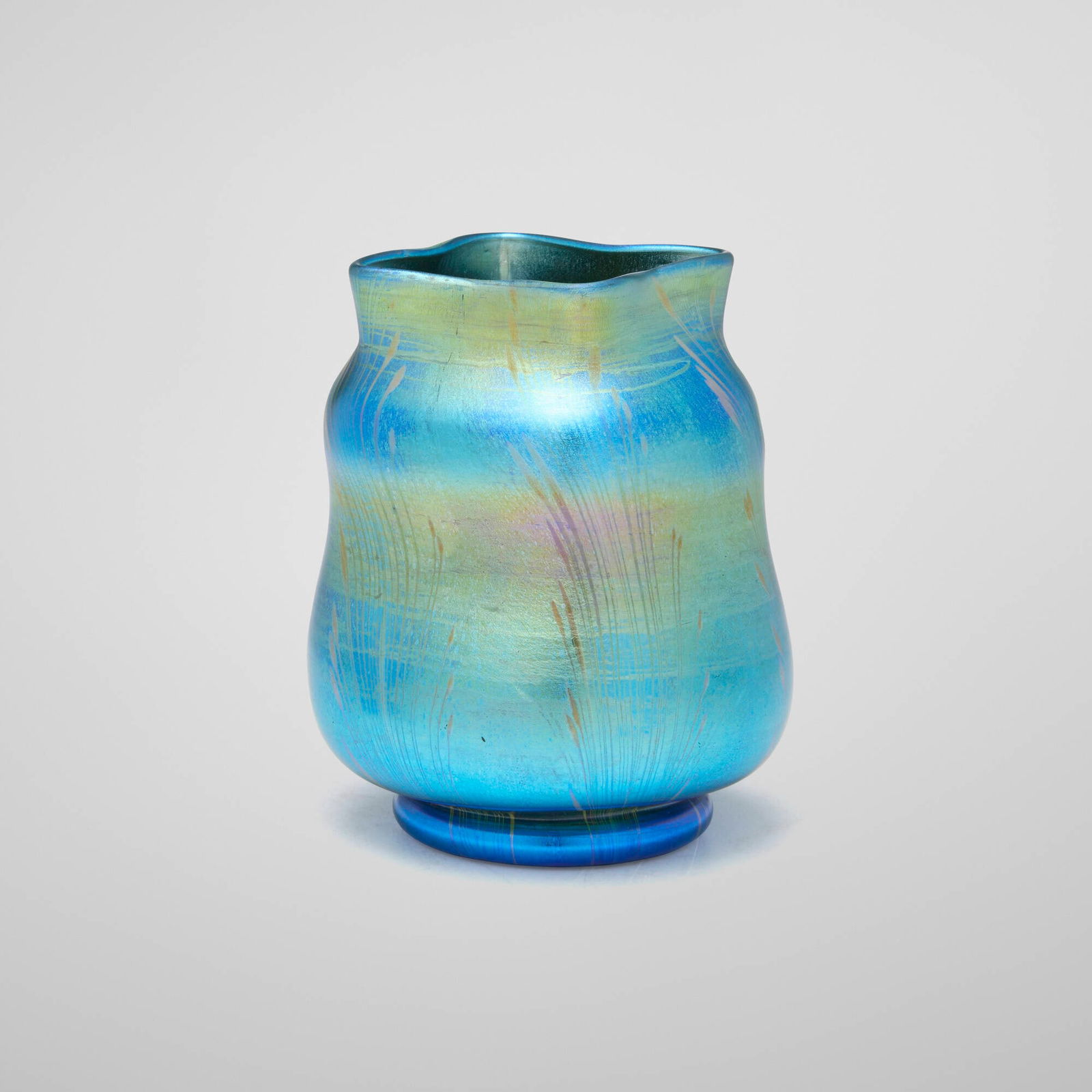 Tiffany Studios, Early cabinet vase: Tiffany Studios Early cabinet vase USA, c. 1898hand-blown Favrile glass 3.75 h x 3 dia in (10 x 8 cm) Etched to underside 'o6720'. This work will ship from Lambertville, Ne