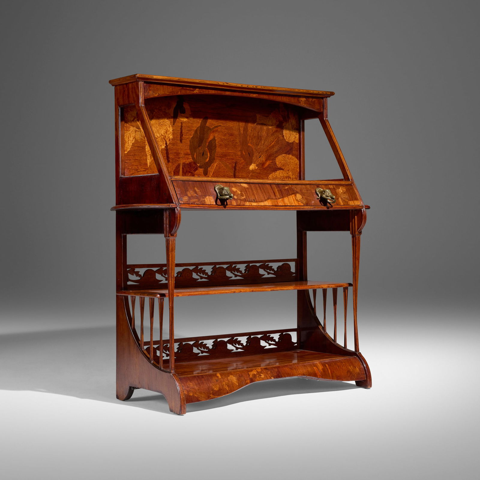 Louis Majorelle, Marquetry buffet with rabbits, flora, and snails: Louis Majorelle Marquetry buffet with rabbits, flora, and snails France, c. 1900 mahogany, gilt bronze, mixed wood and burl inlay 56.75 h x 52 w x 21 d in (144 x 132 x 53 cm) Buffet features a