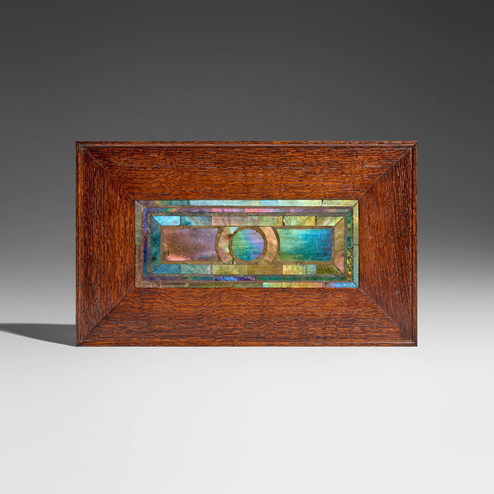 Tiffany Studios, Decorative mosaic panel: Tiffany Studios Decorative mosaic panel USA, c. 1910 Favrile glass, oak frame 10.5 h x 17.5 w x 1 d in (27 x 44 x 3 cm) Provenance: Collection of Gary Diamond, Los Angeles This work will ship