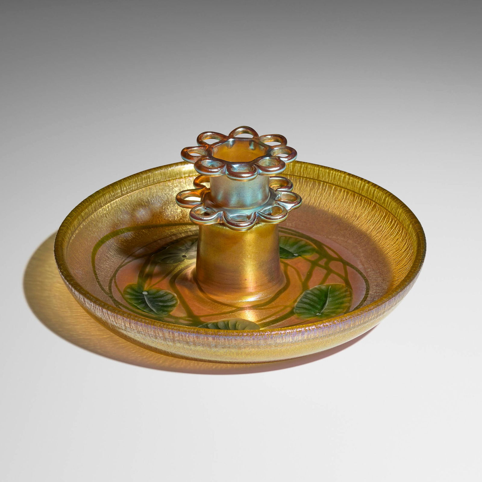 Tiffany Studios, Leaf and Vine flower bowl and frog: Tiffany Studios Leaf and Vine flower bowl and frog USA, c. 1917 hand-blown Favrile glass 4.25 h x 9.5 dia in (11 x 24 cm) Etched to underside of each element '7868L L. C. Tiffany - Favrile'. 