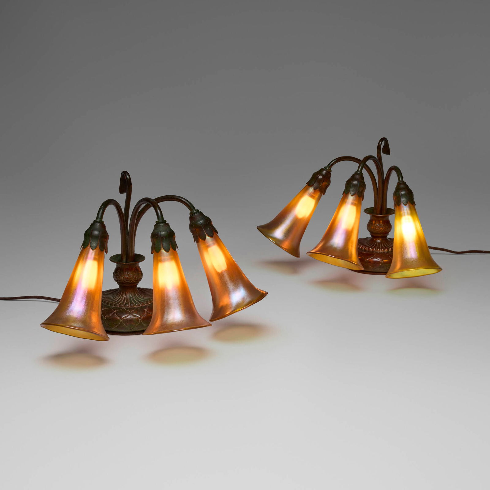 Tiffany Studios, Three-light Lily piano lamp bases, pair (1 of 7)