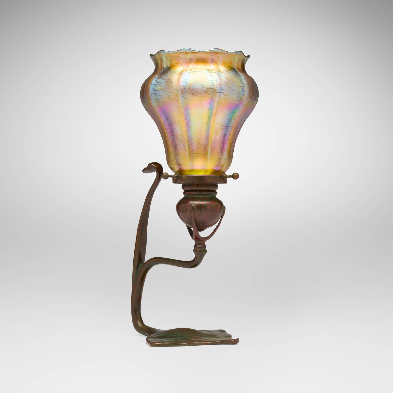 Tiffany Studios, Candlestick: Tiffany Studios Candlestick USA, c. 1910patinated bronze, hand-blown glass 12.5 h x 6 w x 5.25 d in (32 x 15 x 13 cm) Impressed to base 'TIFFANY STUDIOS NEW YORK 1203'. Sold with a ribbed art