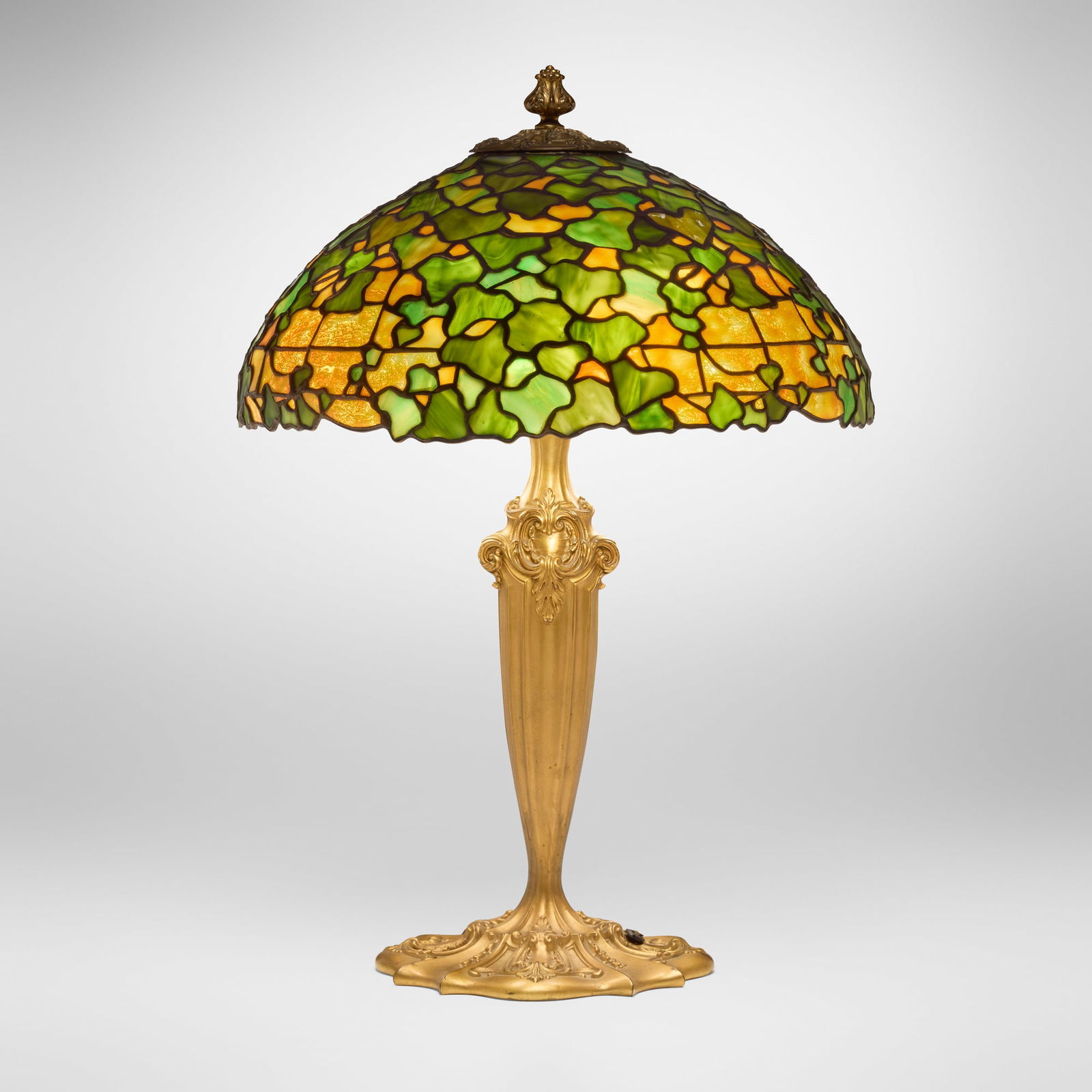 Duffner & Kimberly, Ivy table lamp: Duffner & Kimberly Ivy table lamp USA, c. 1910leaded glass, gilt bronze 23 h x 16 dia in (58 x 41 cm) Impressed manufacturer's mark to stem 'The Duffner & Kimberly Company New York'. Impressed