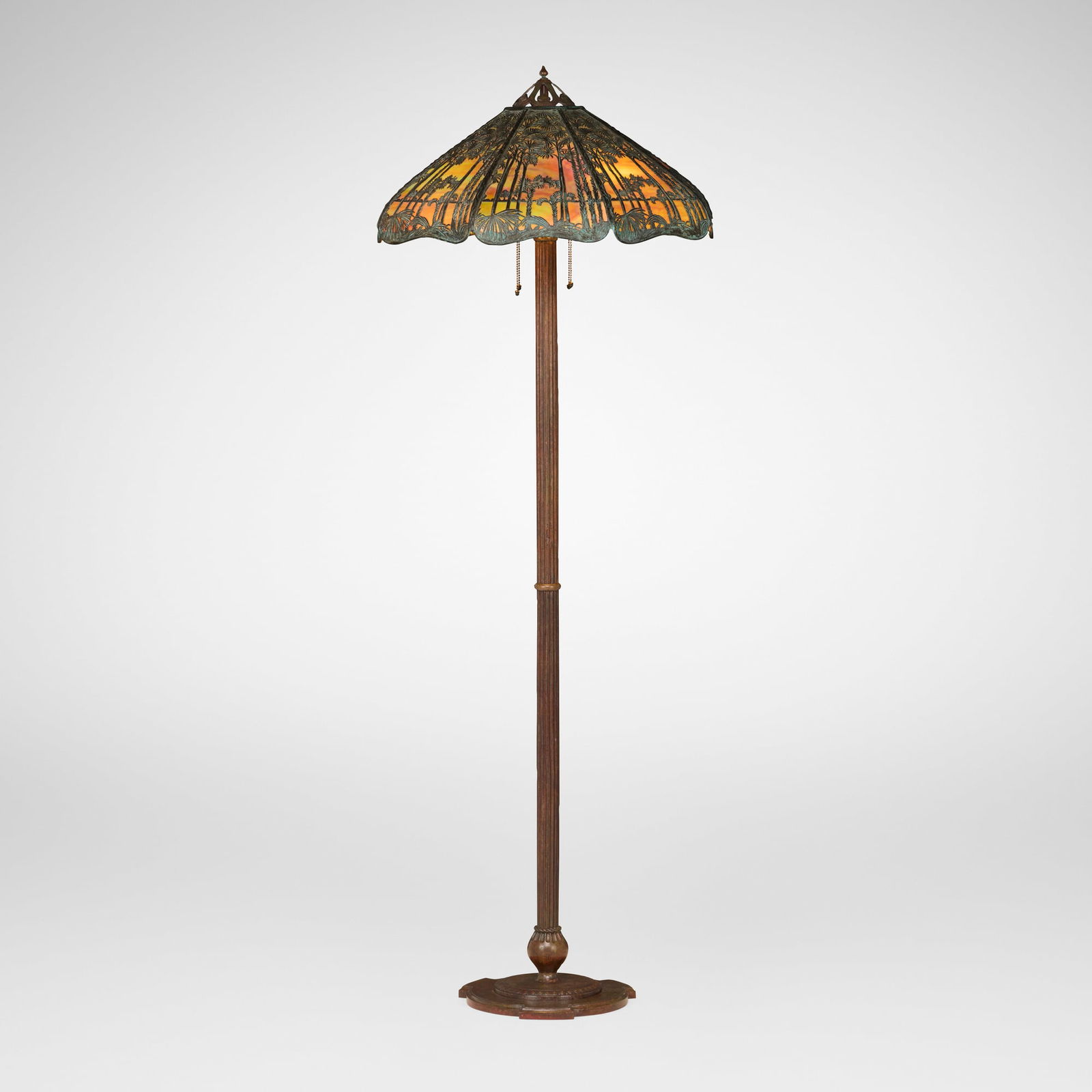 Handel, Teroca overlay scenic Sunset Palm tree floor lamp: Handel Teroca overlay scenic Sunset Palm tree floor lamp USA, c. 1910 patinated metal, slag glass 69.5 h x 24.75 w x 24.75 d in (177 x 63 x 63 cm) Raised manufacturer's mark to interior of shade