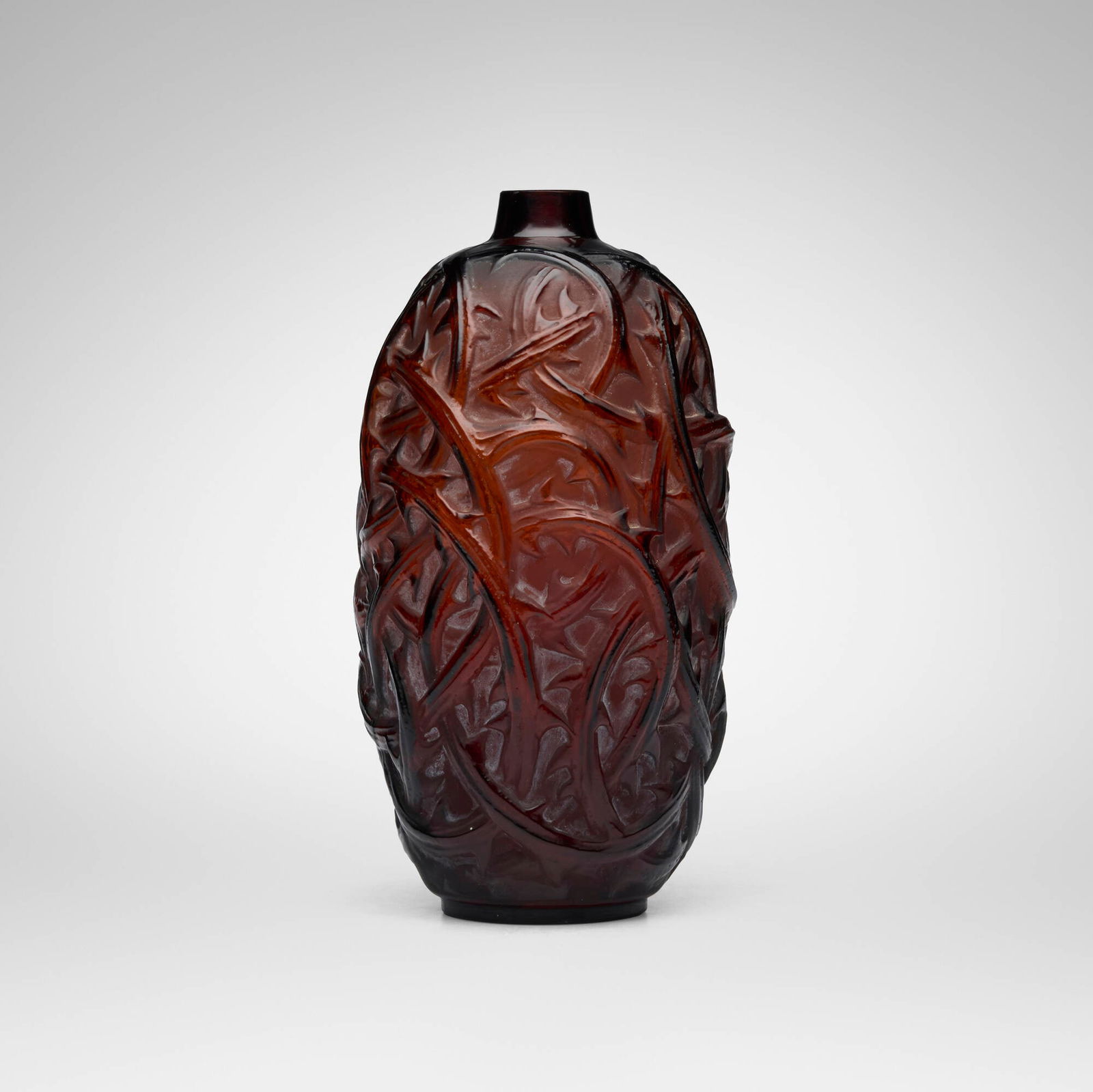 Rene Lalique, Ronces vase: Rene Lalique Ronces vase France, c. 1921 clear and frosted amber glass with white patina 9.25 h x 5 dia in (23 x 13 cm) Molded signature to underside 'R. Lalique'. Literature: R. Lalique: